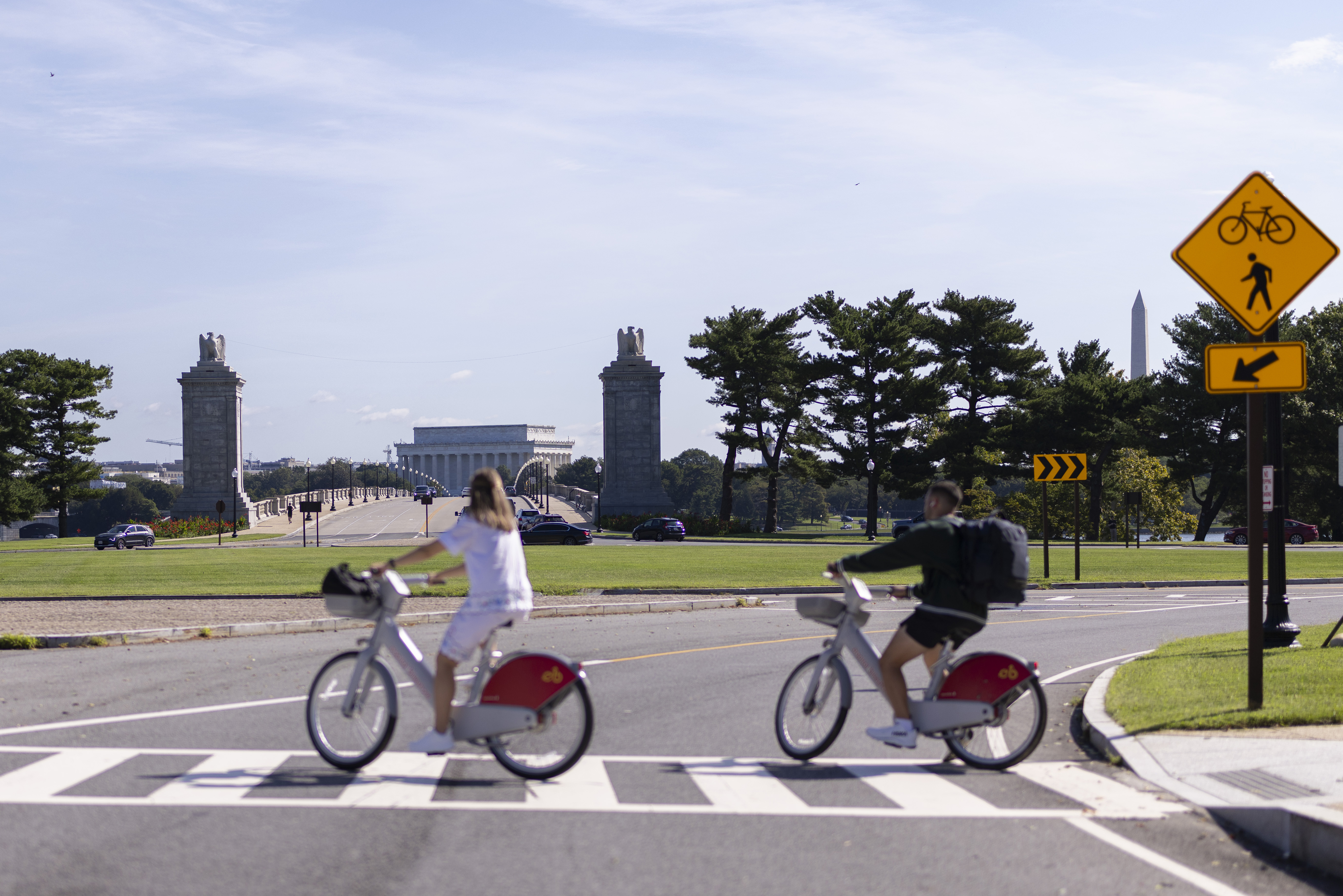 Bicyclists ride on Sept. 4 around Memorial Circle, site of the proposed triumphal arch. (Finn Gomez/Getty Images)