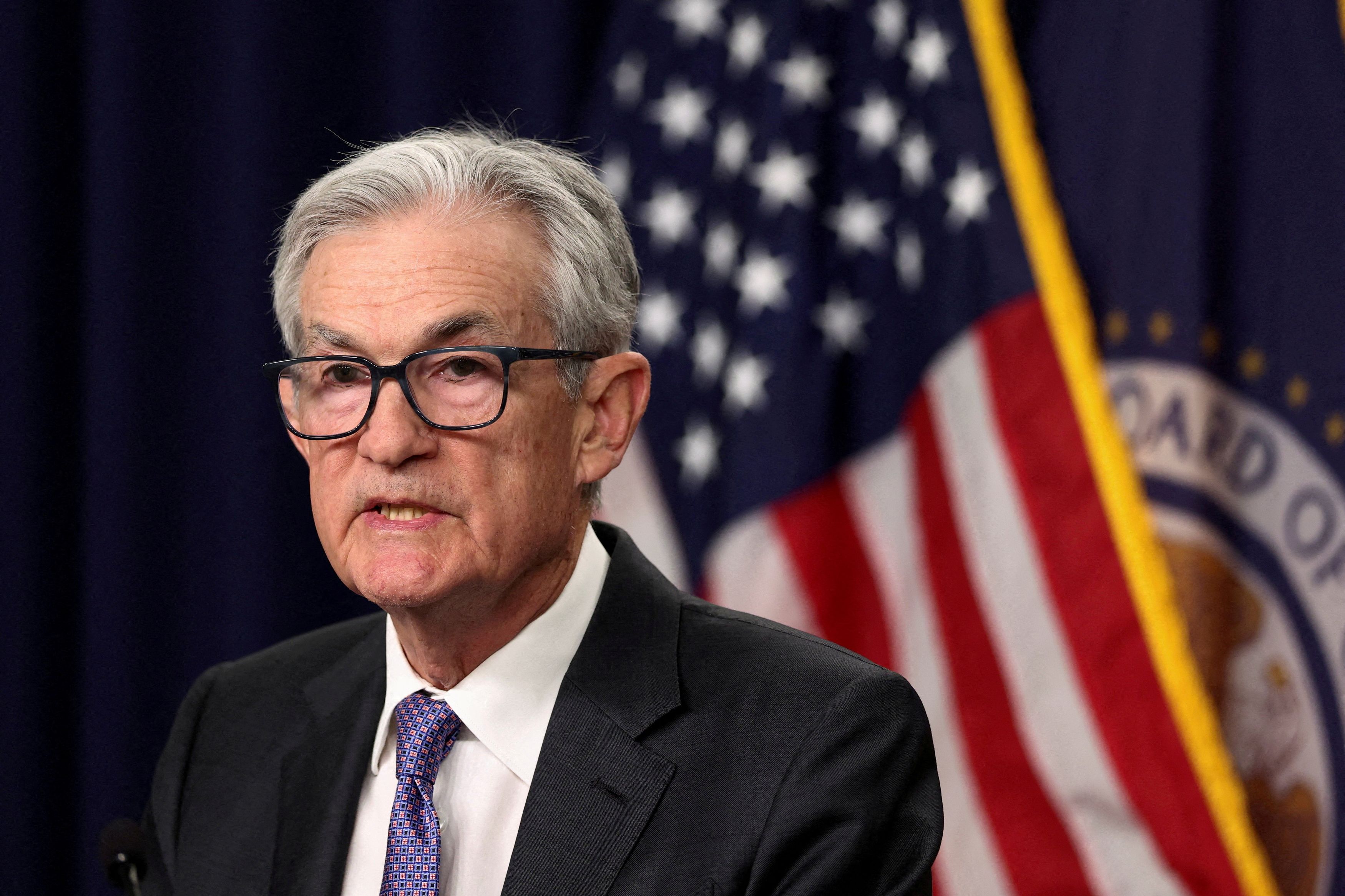 Federal Reserve Chair Jerome H. Powell holds a news conference in December. (Kevin Lamarque/Reuters)