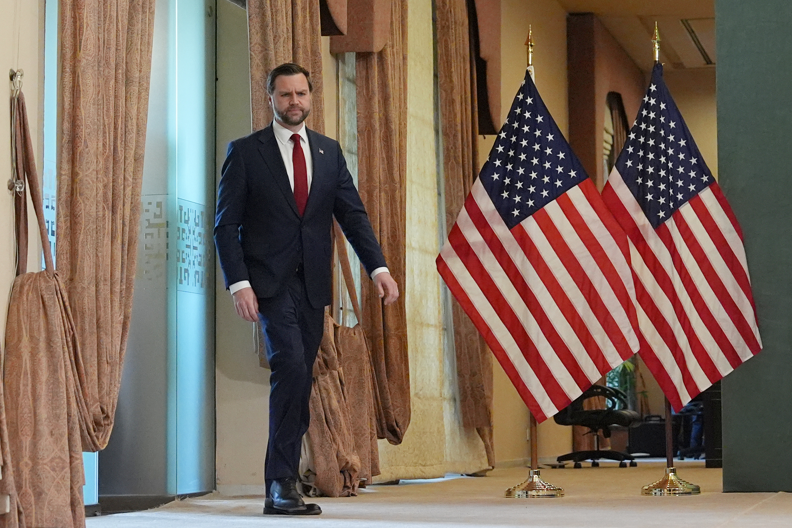 Vice President JD Vance arrives for a news conference after meeting with Pakistani and Iranian representatives in Islamabad, Pakistan, on Sunday. (Jacquelyn Martin/Pool/AP)