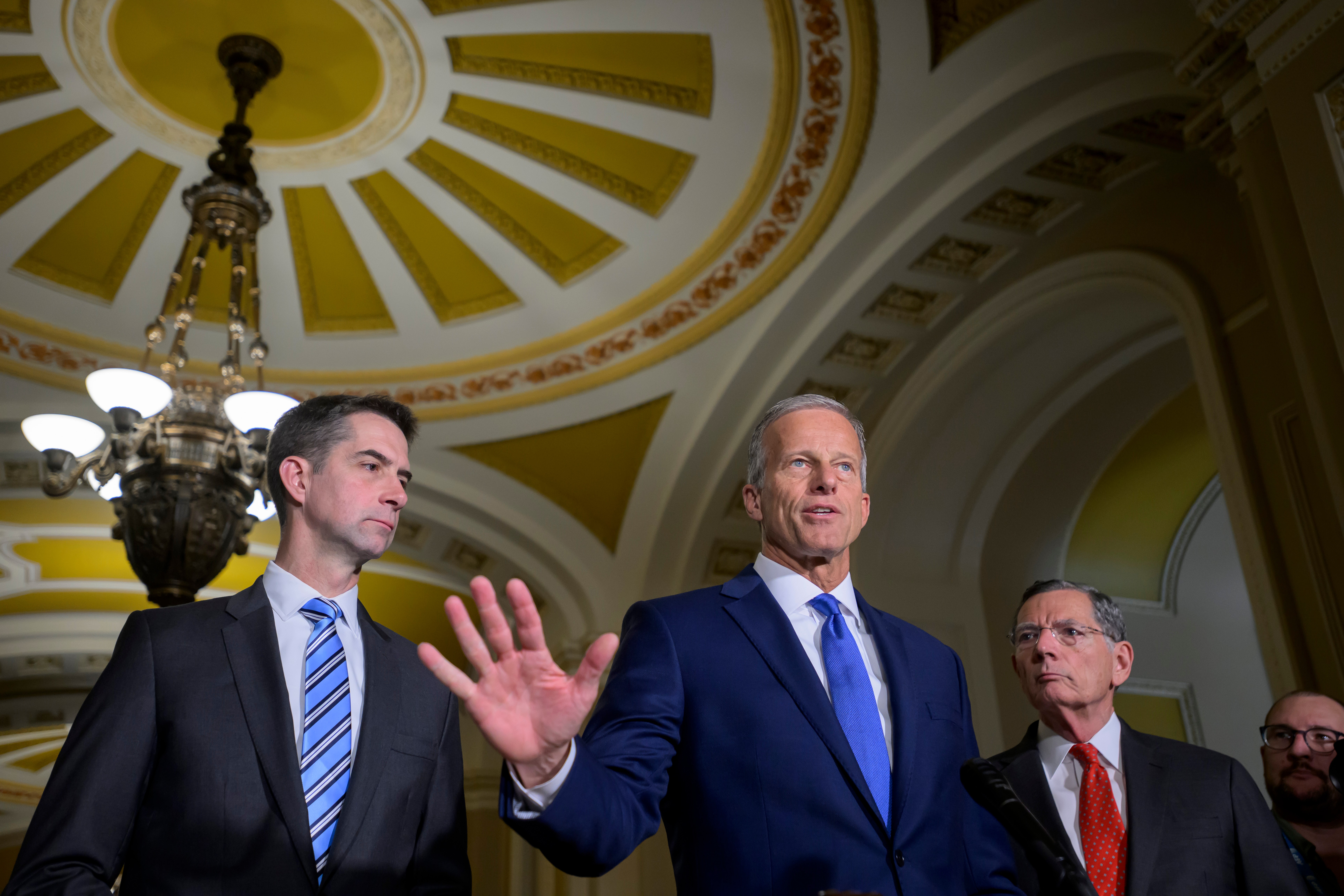 Senate Majority Leader John Thune (R-South Dakota), center, at the Capitol on Tuesday with Sens. Tom Cotton (R-Arkansas), left, John Barrasso (R-Wyoming). (Rod Lamkey/AP)