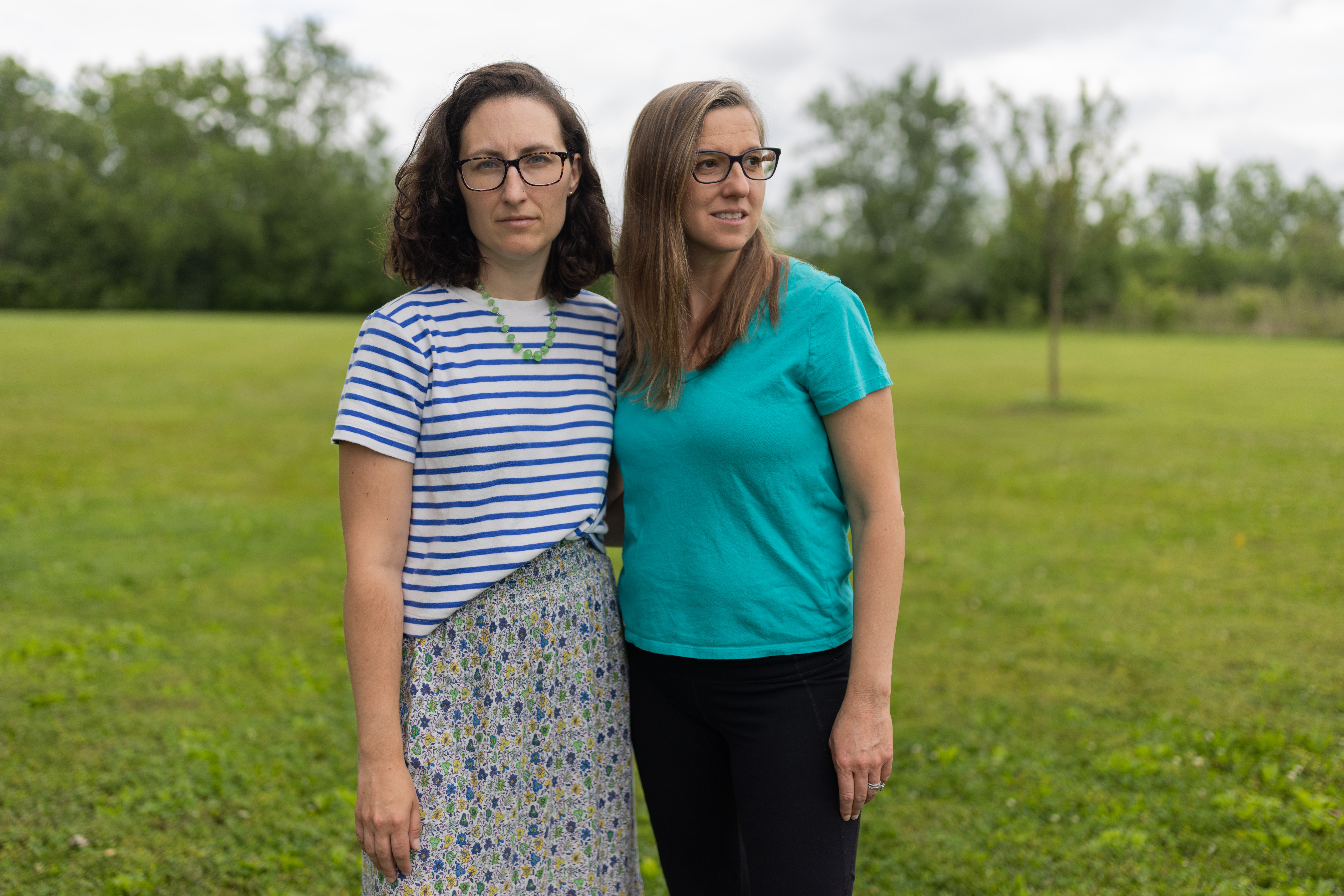 Annette Singh, left, and Annie Cannelongo in a park in their Hilliard, Ohio, neighborhood that is next to a data center. (Maddie McGarvey/For The Washington Post)