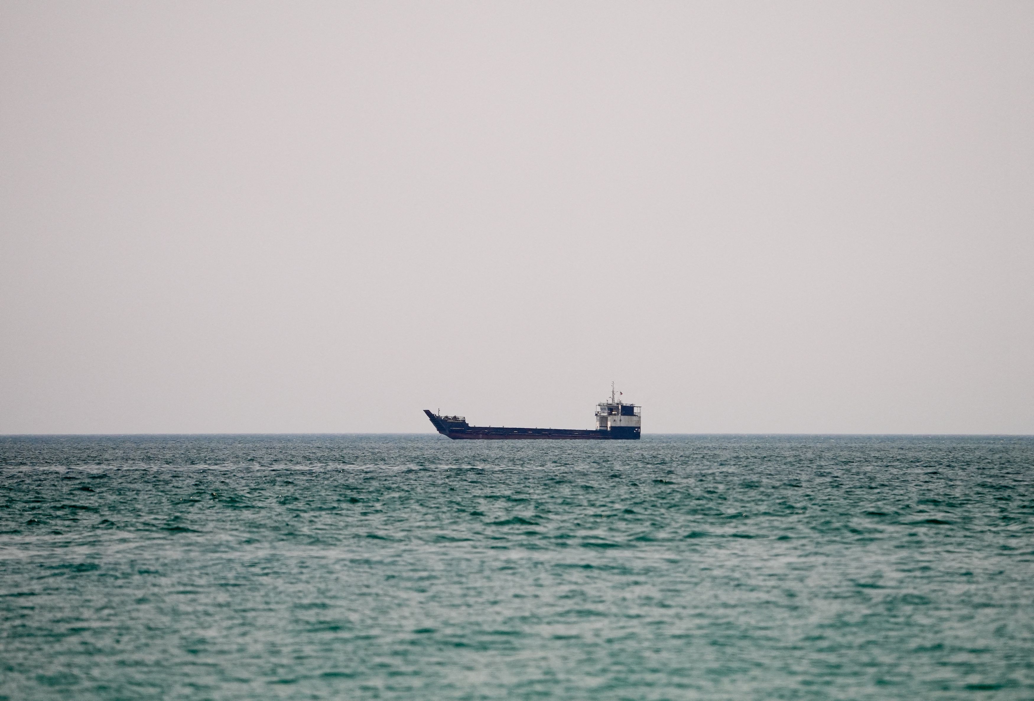A vessel at the Strait of Hormuz, as seen from Musandam, Oman, on Monday. (Reuters)