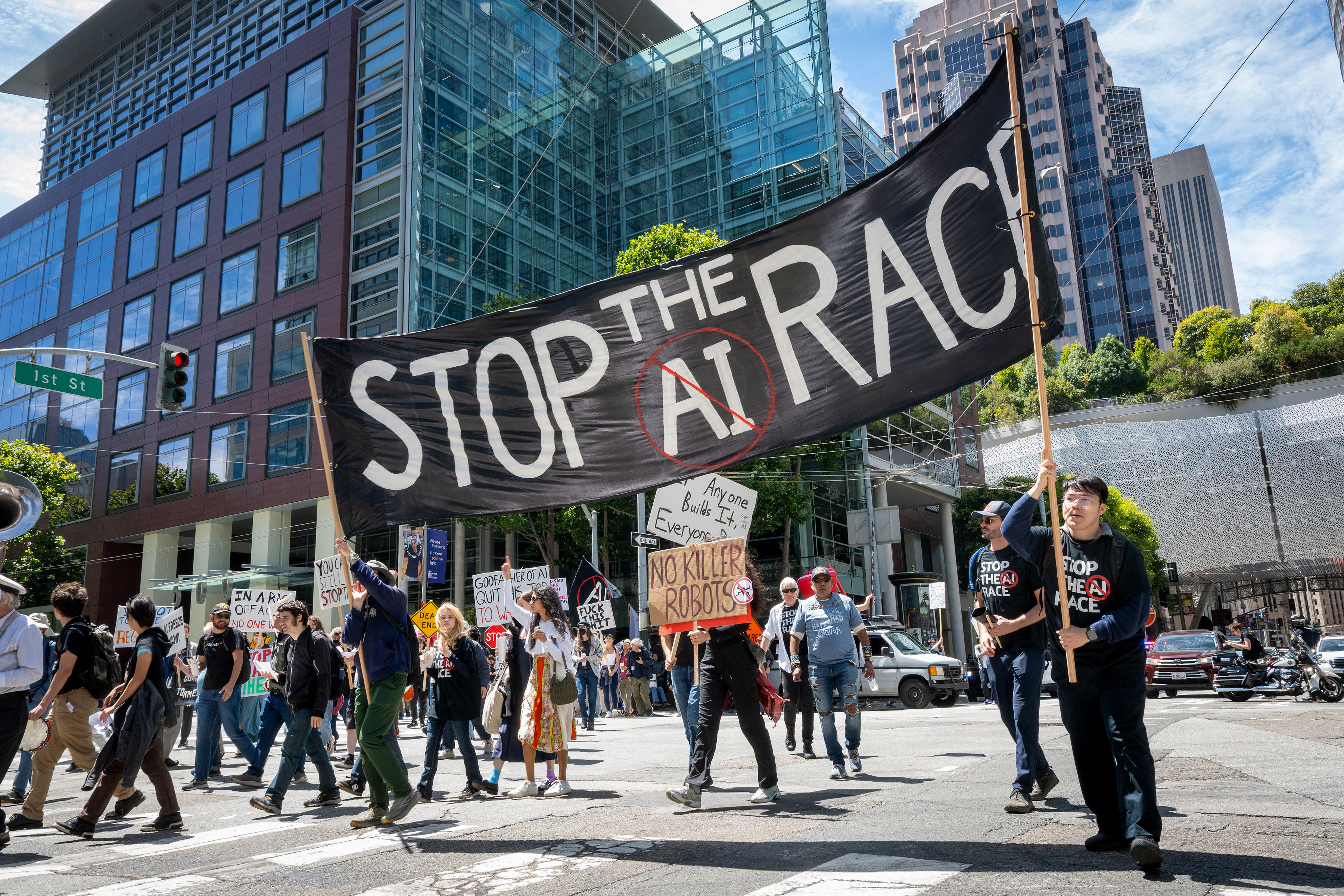 Demonstrators participate in a "Stop the AI Race" march in San Francisco on July 11. (Karl Mondon/AFP/Getty Images)