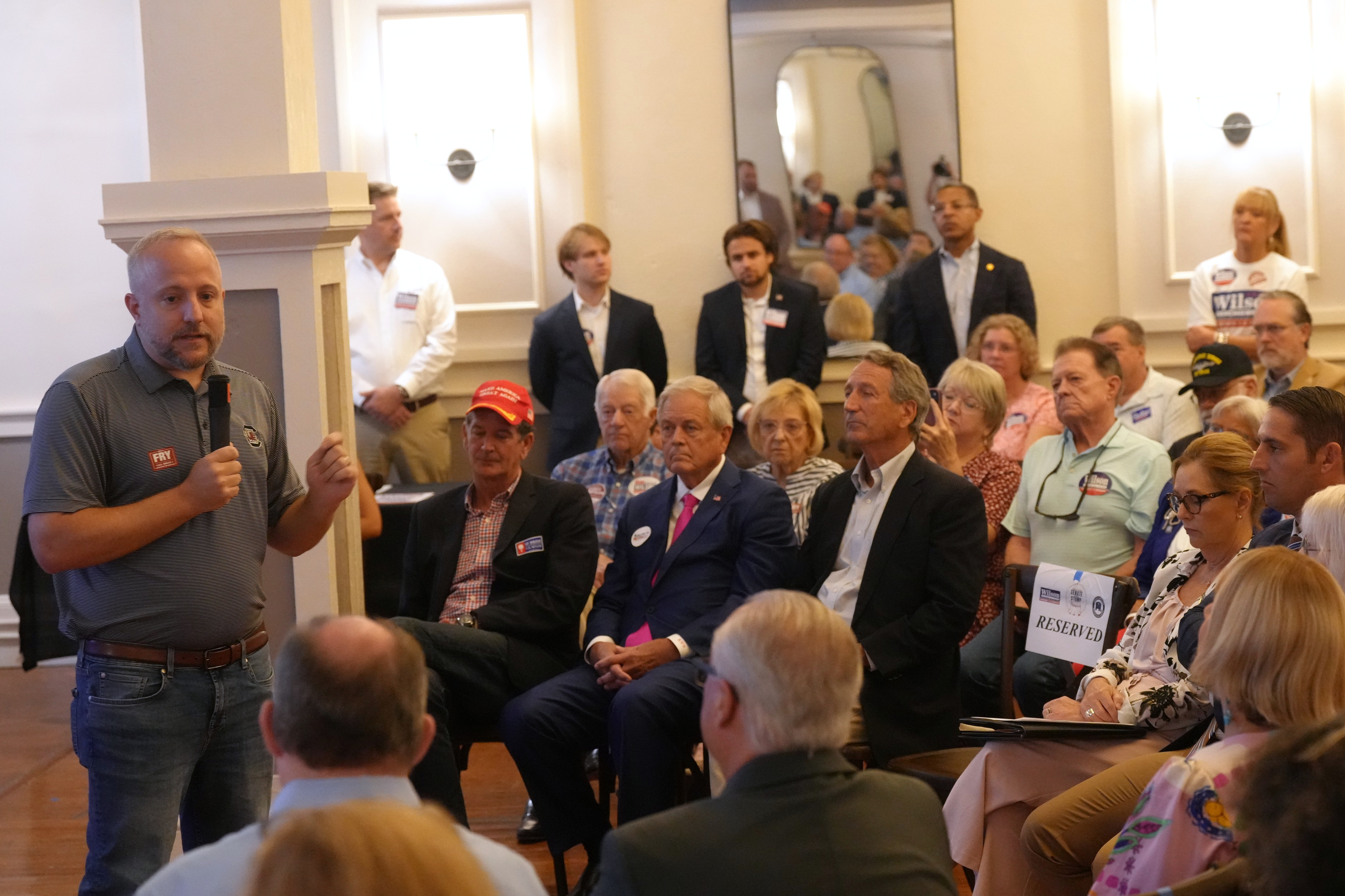 Russell Fry, left, at a campaign event with other candidates vying for the Senate seat last week. (Meg Kinnard/AP)