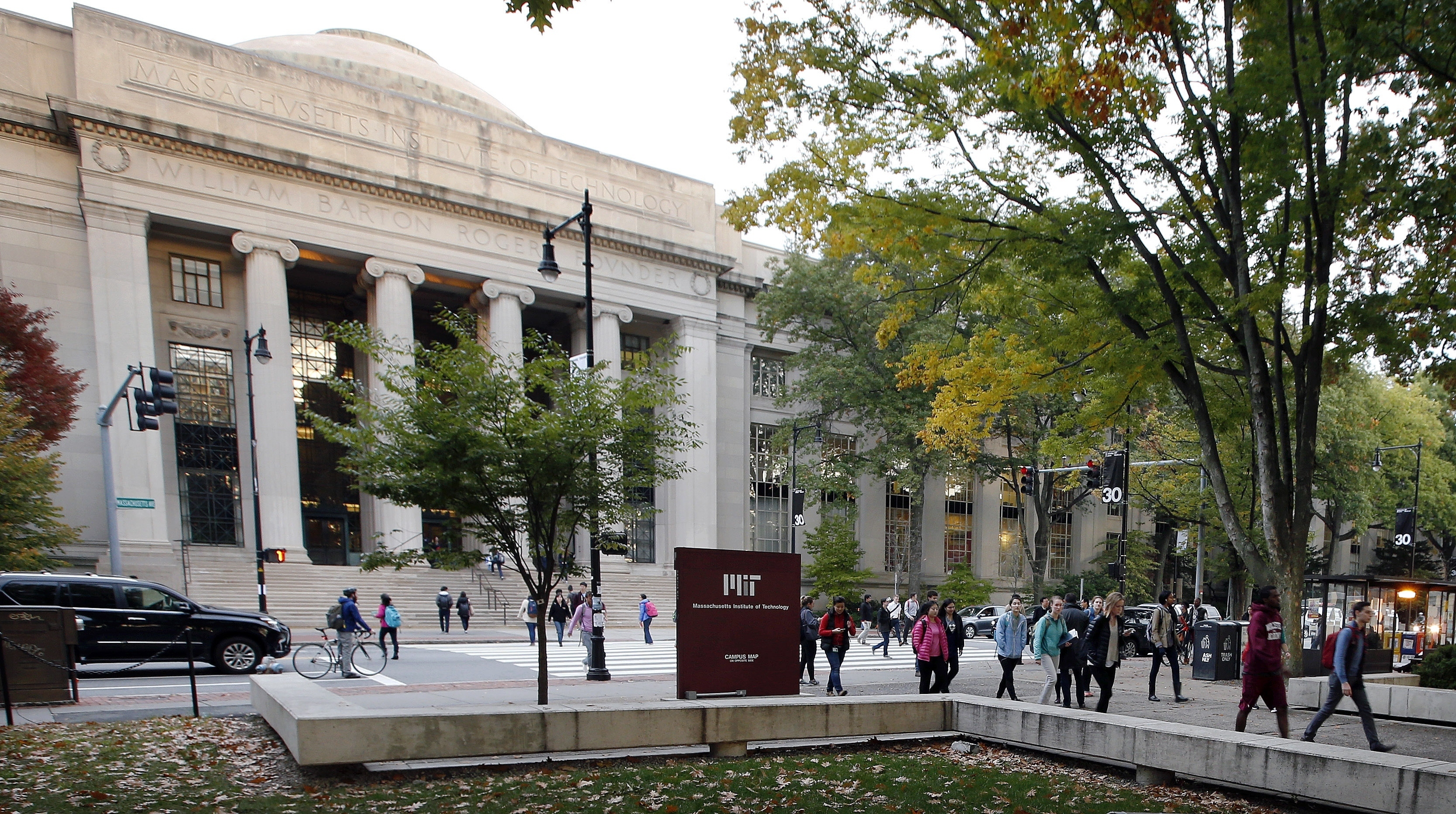 Students walk on the MIT campus in Cambridge. (Michael Dwyer/AP)