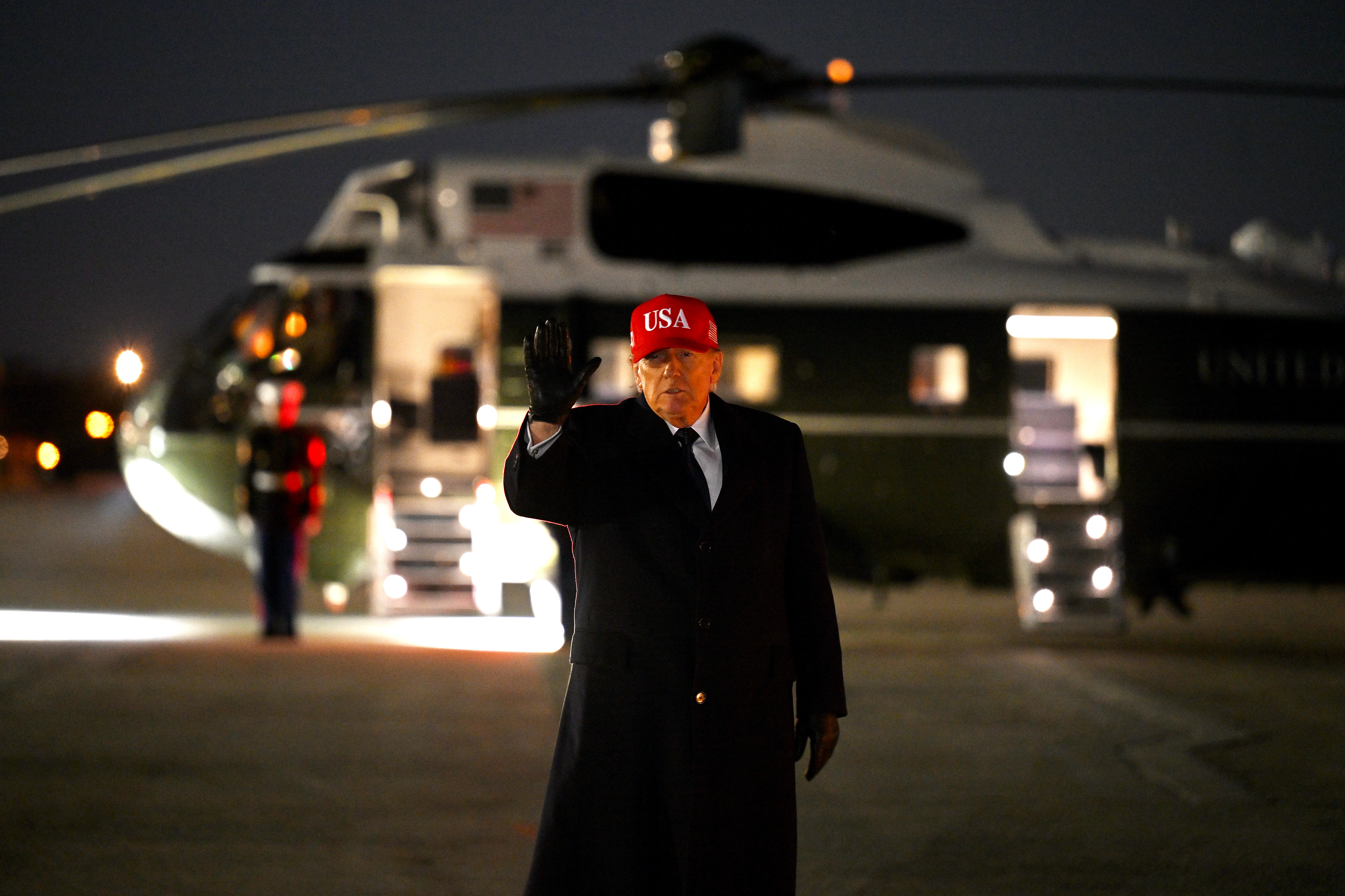 President Trump prepares to board Marine One at Joint Base Andrews, Maryland on Sunday. (Roberto Schmidt/Getty Images)