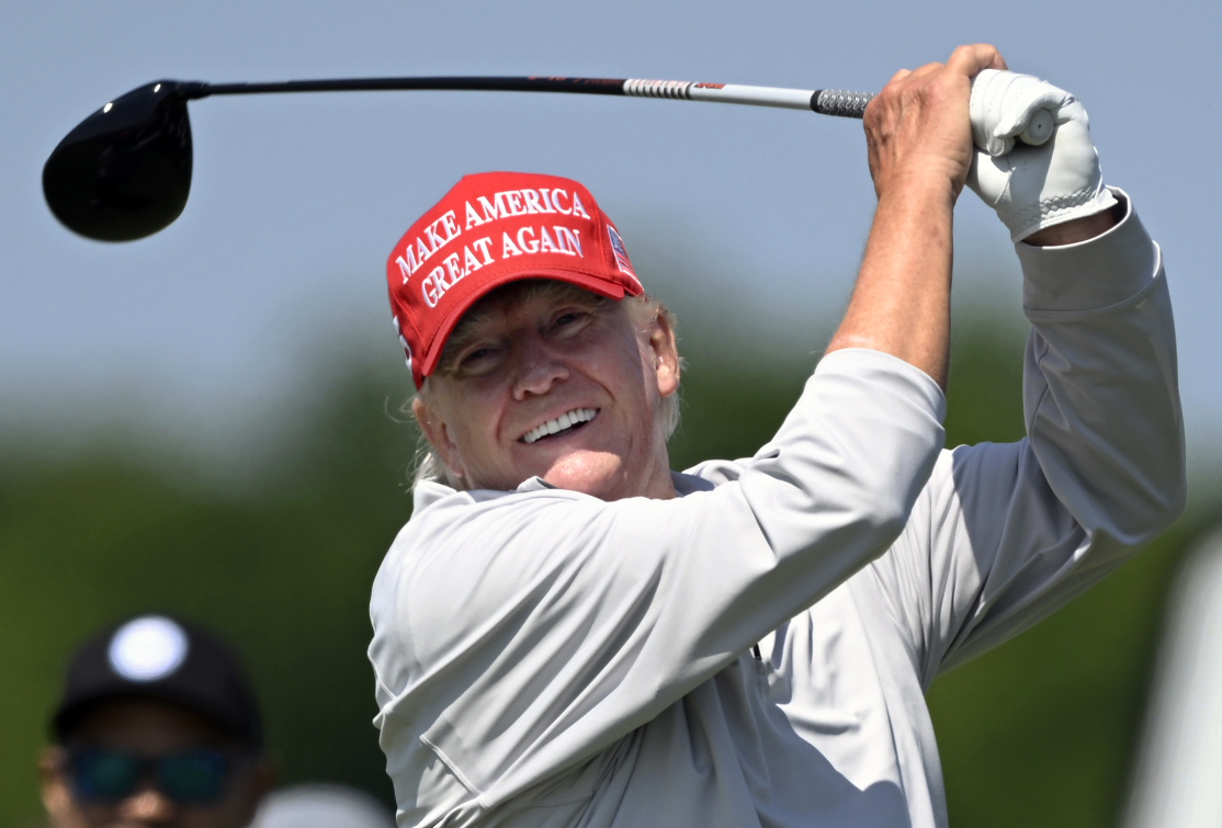 Former and future president Donald Trump participates in a pro-am event for LIV Golf at his Trump National Golf Club in Sterling, Virginia, on May 25, 2023. (John McDonnell/The Washington Post)