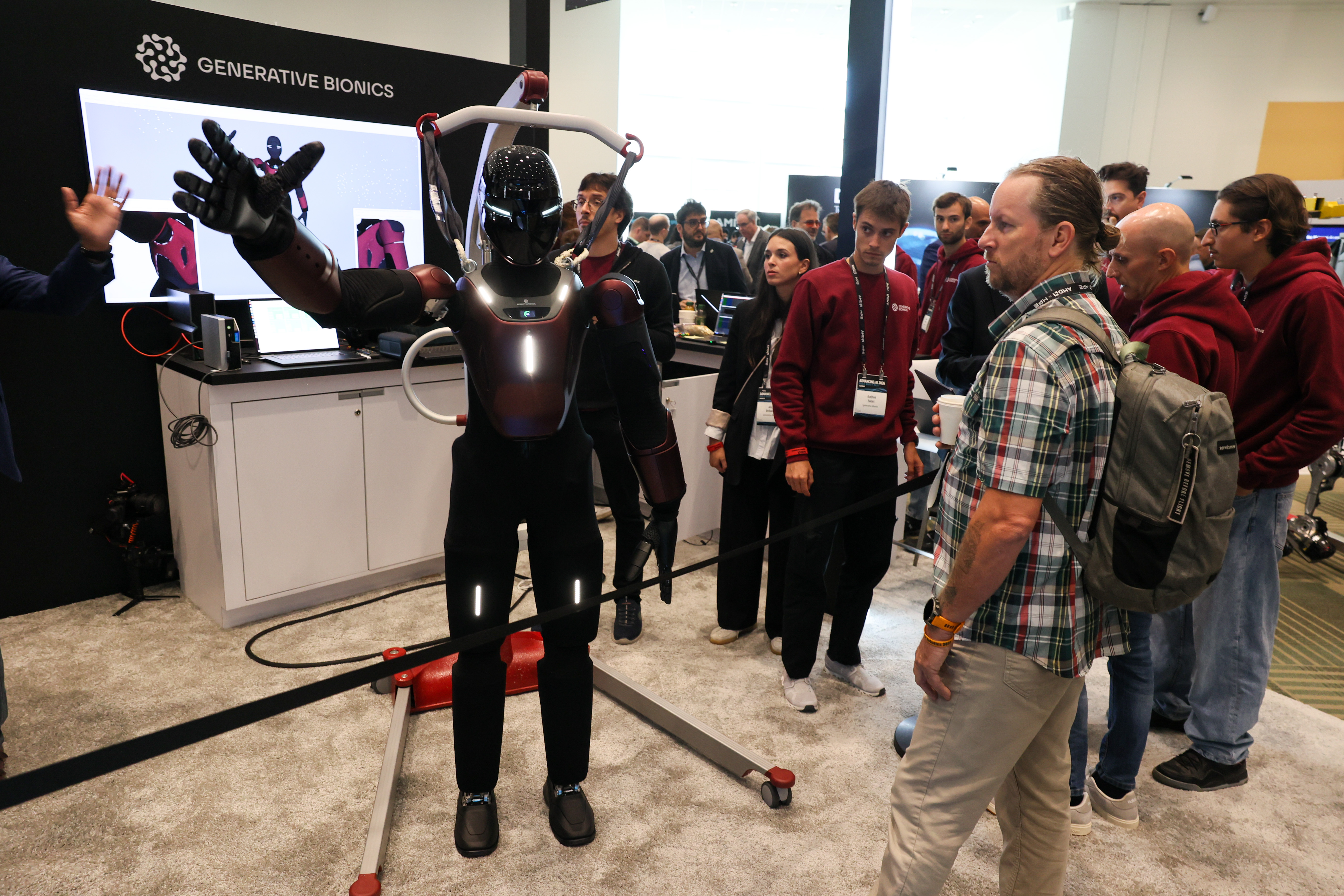 The Gene.01 humanoid robot from Italy's Generative Bionics demonstrates a wave last week at the AMD Advancing AI 2026 conference in San Francisco. (Juliana Yamada/AP)