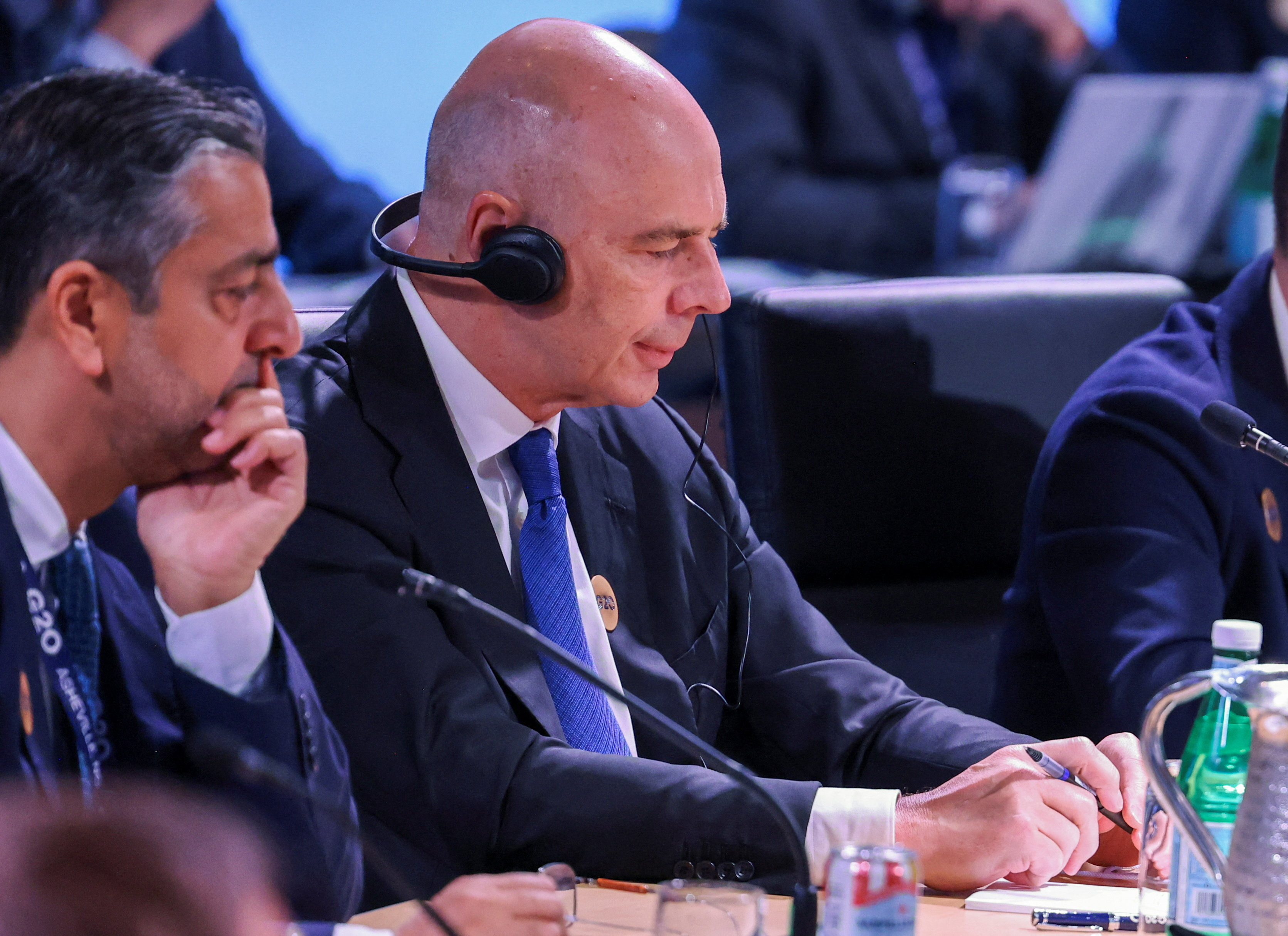 Russian finance minister, invited by Trump, draws objections at G-20 meeting; first in-person appearance since Ukraine invasion sparks European protests
