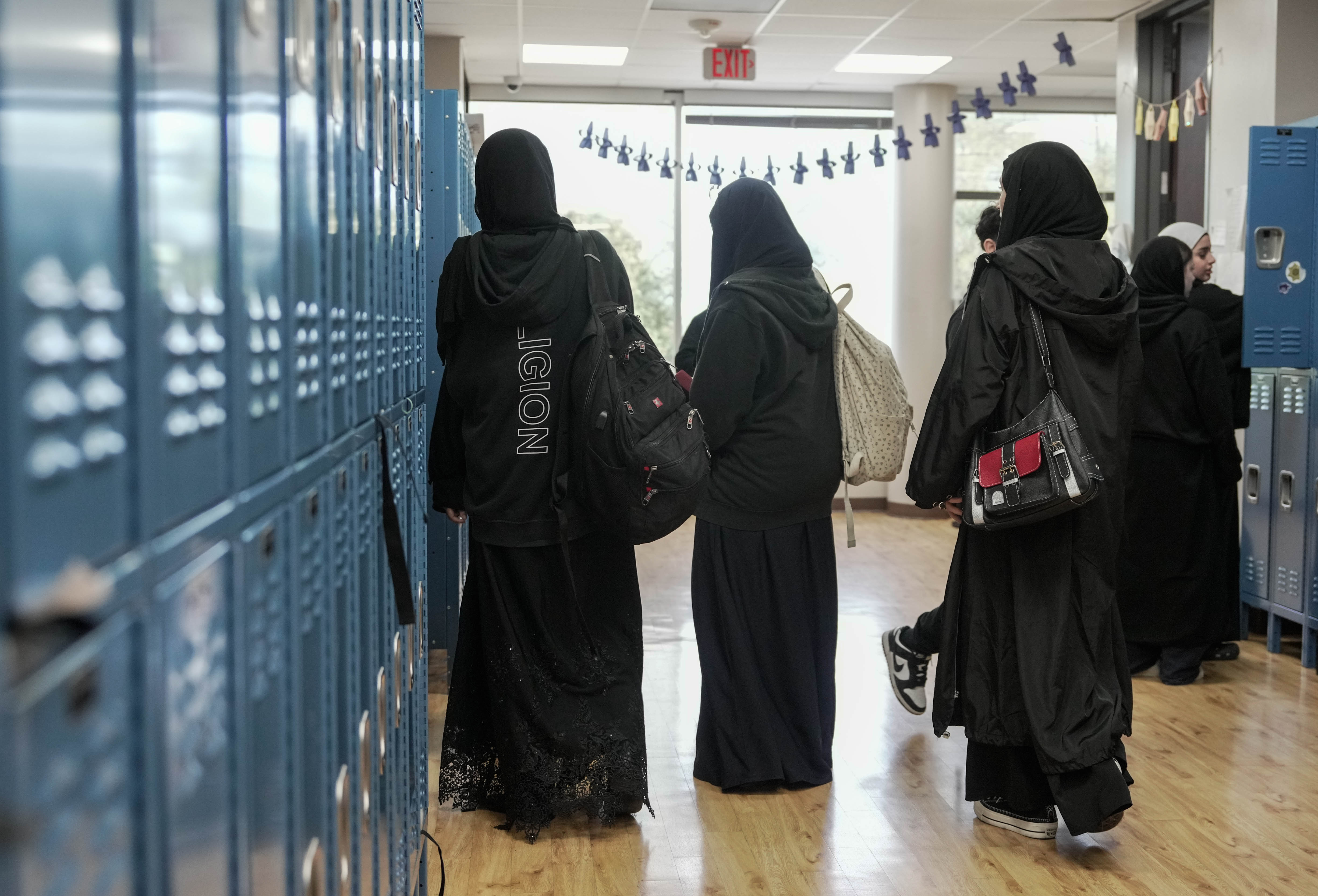 Students at Iman Academy Southwest in Houston walk to class last year. (Houston Chronicle/Hearst Newspapers/Getty Images)