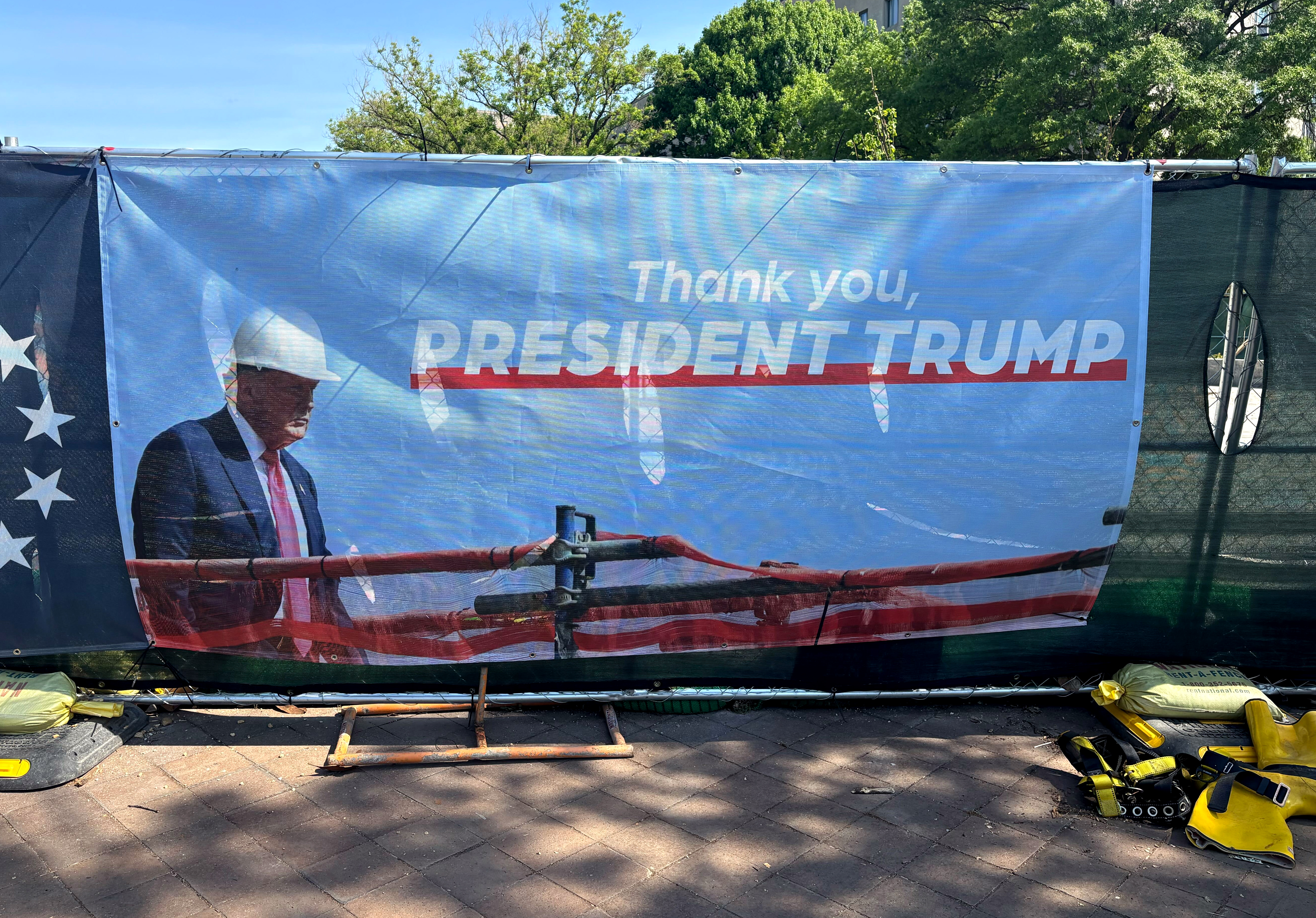 A banner thanking President Donald Trump for improvements to Logan Circle. (Philip Kennicott/The Washington Post)