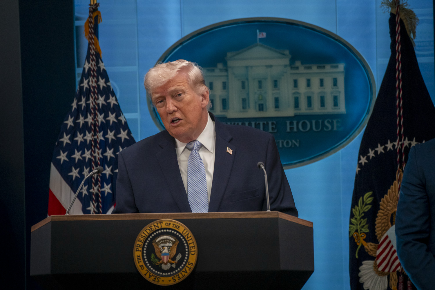 President Donald Trump speaks to reporters at the White House about the Iran war on April 6. (Maxine Wallace/The Washington Post)