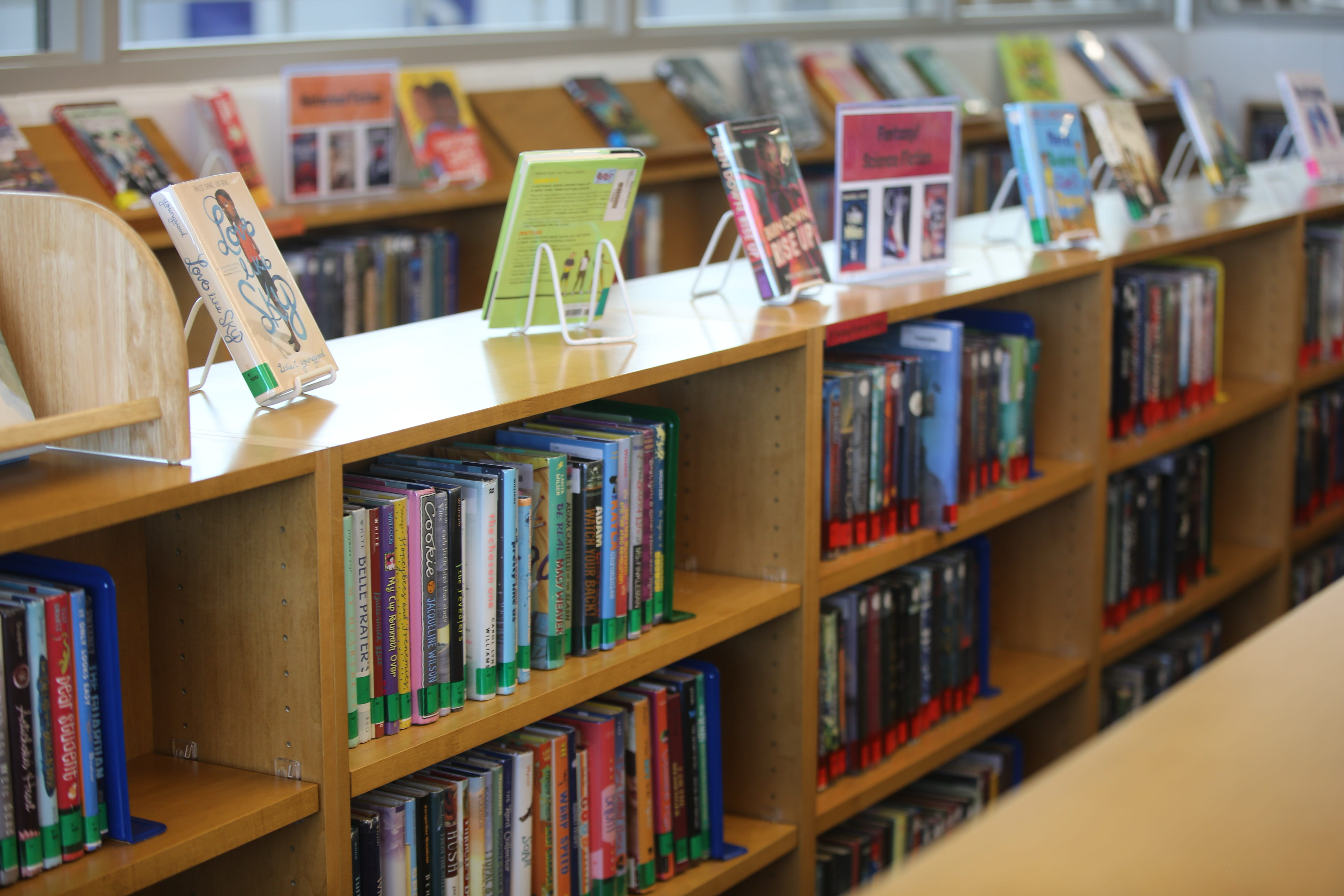 Book shelves in a middle school library in Kansas. (Jason Alatidd/USA TODAY Network/Reuters)