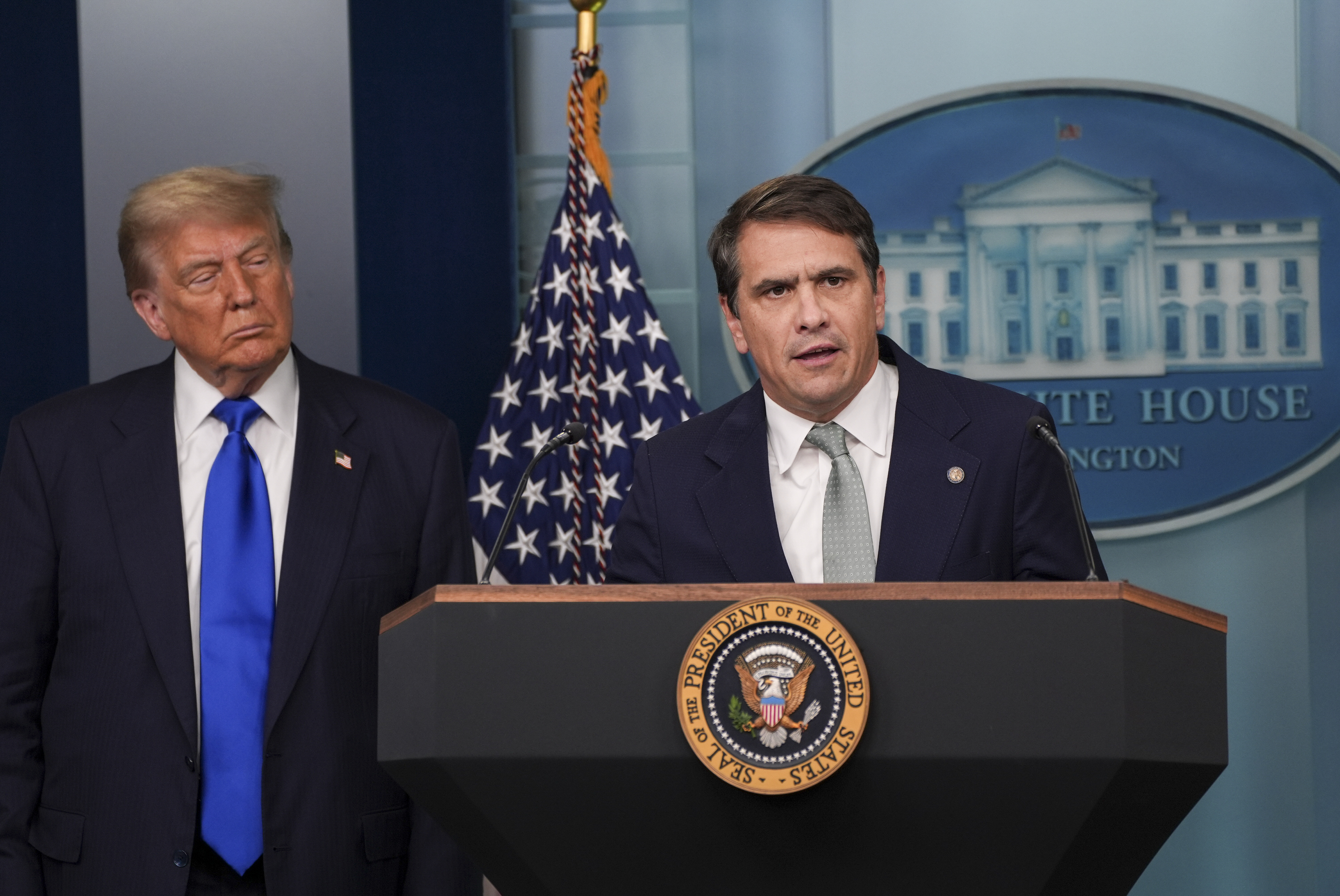 President Donald Trump and acting attorney general Todd Blanche in June. (Demetrius Freeman/The Washington Post)