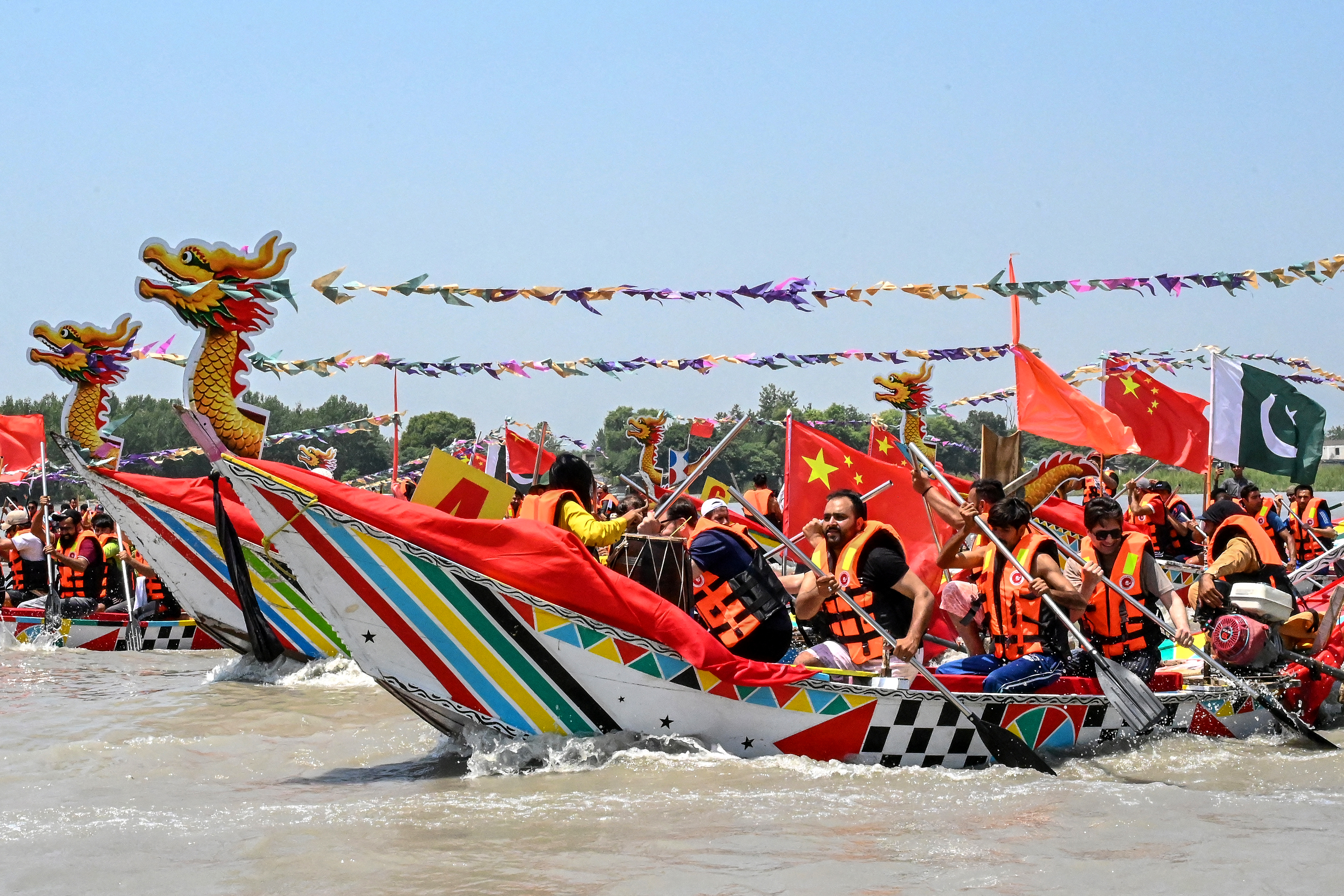 Pakistanis participate in the Chinese Dragon Boat Festival, organized as a cultural exchange between the two countries, in Charsadda last month. (Abdul Majeed/AFP/Getty Images)