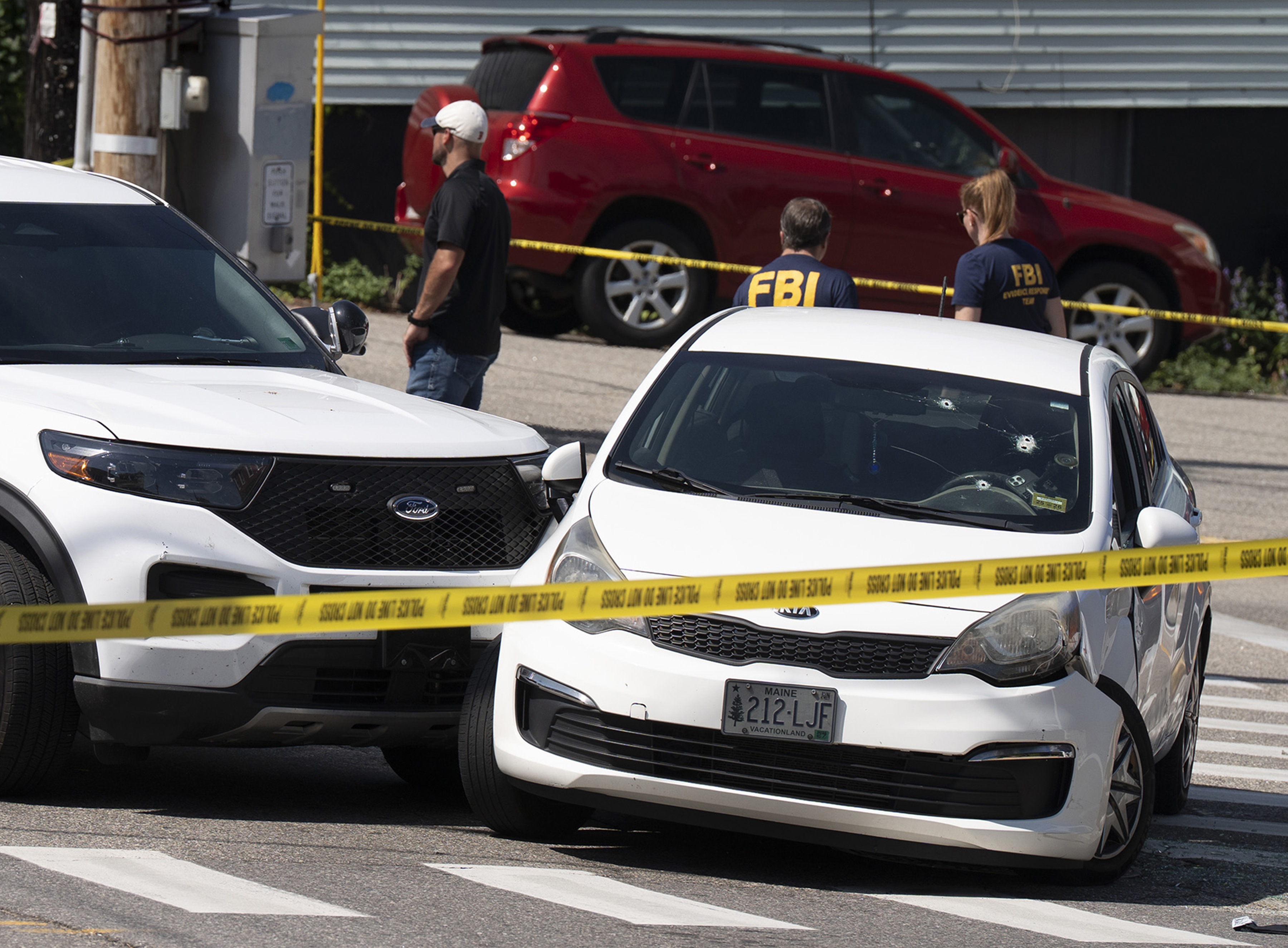A sedan driven by a man fatally shot by immigration agents in Biddeford, Maine, on Monday. (Gregory Rec/Portland Press Herald/Getty Images)