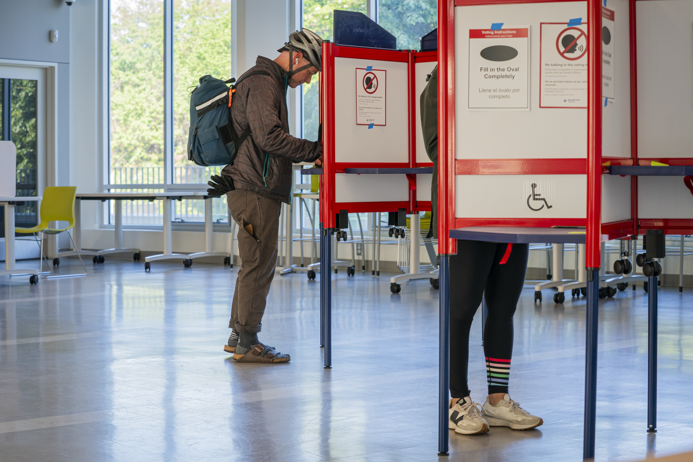 People cast their ballots at the Washington-Liberty Annex polling location Tuesday in Arlington, Virginia. (Maxine Wallace/The Washington Post)