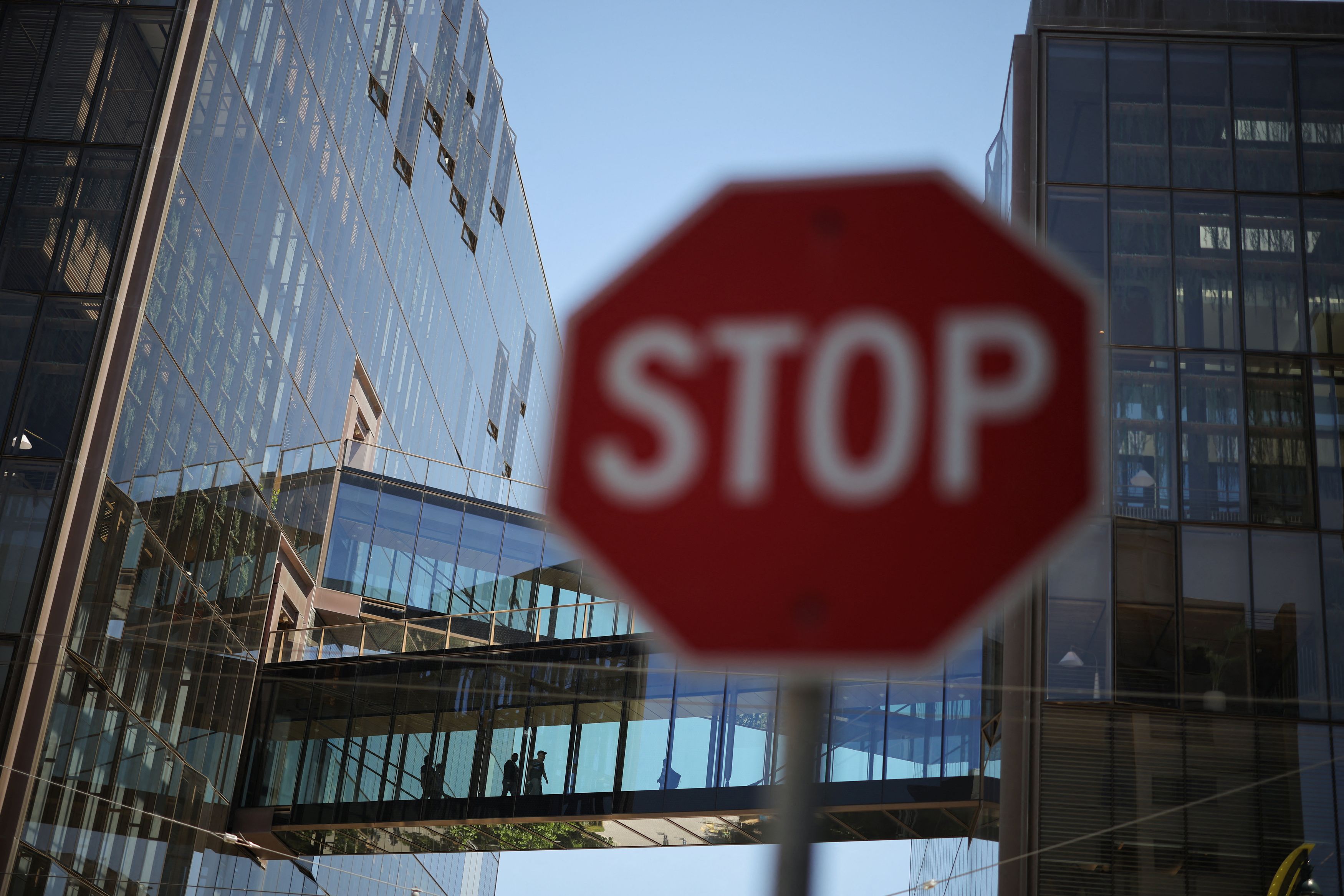 A stop sign outside the OpenAI headquarters in San Francisco on May 18. (Carlos Barria/Reuters)