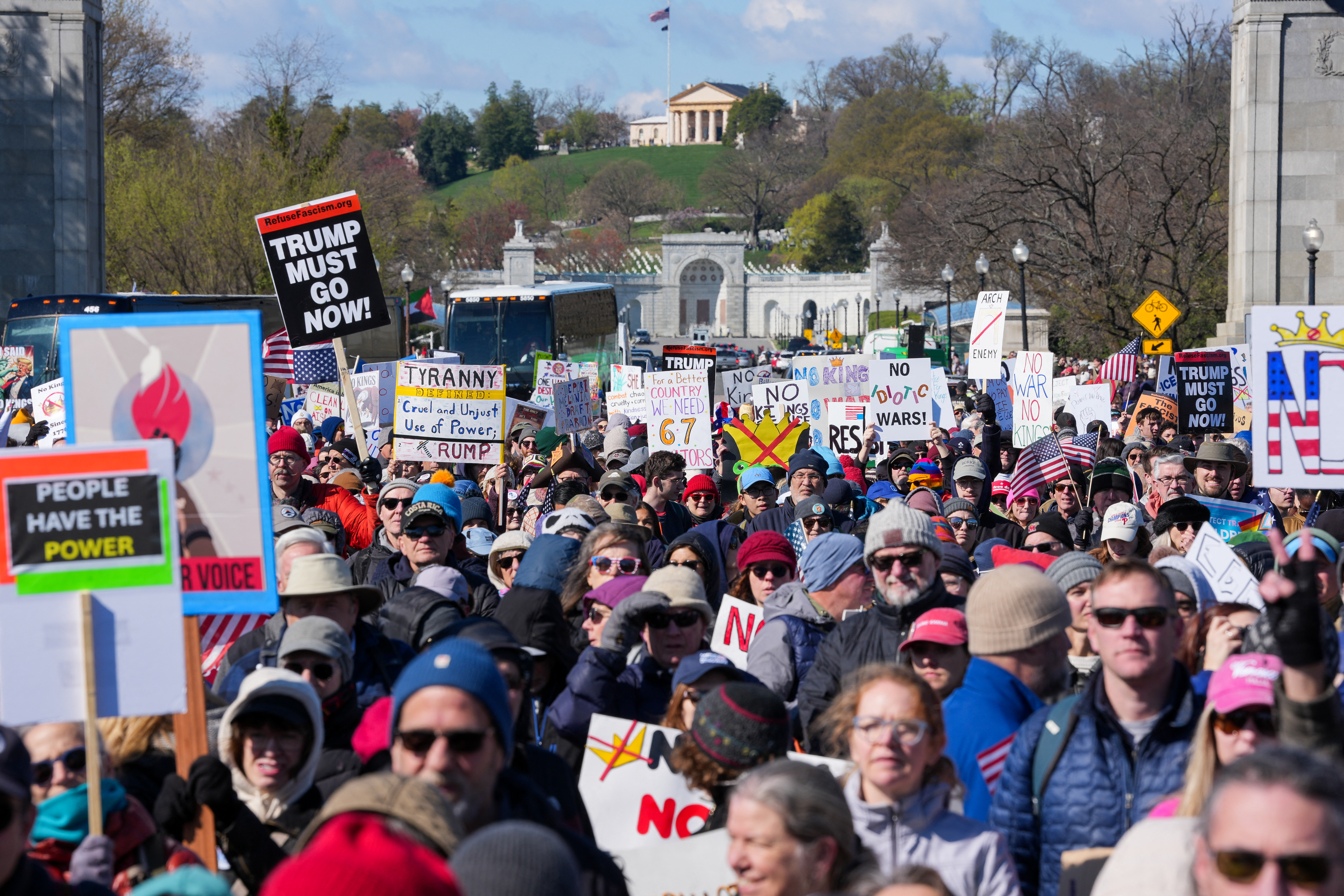 Demonstrators walk across Memorial Bridge from Arlington, Virginia, into D.C. during the No Kings protest on Saturday. (Ken Cedeno/AFP/Getty Images)