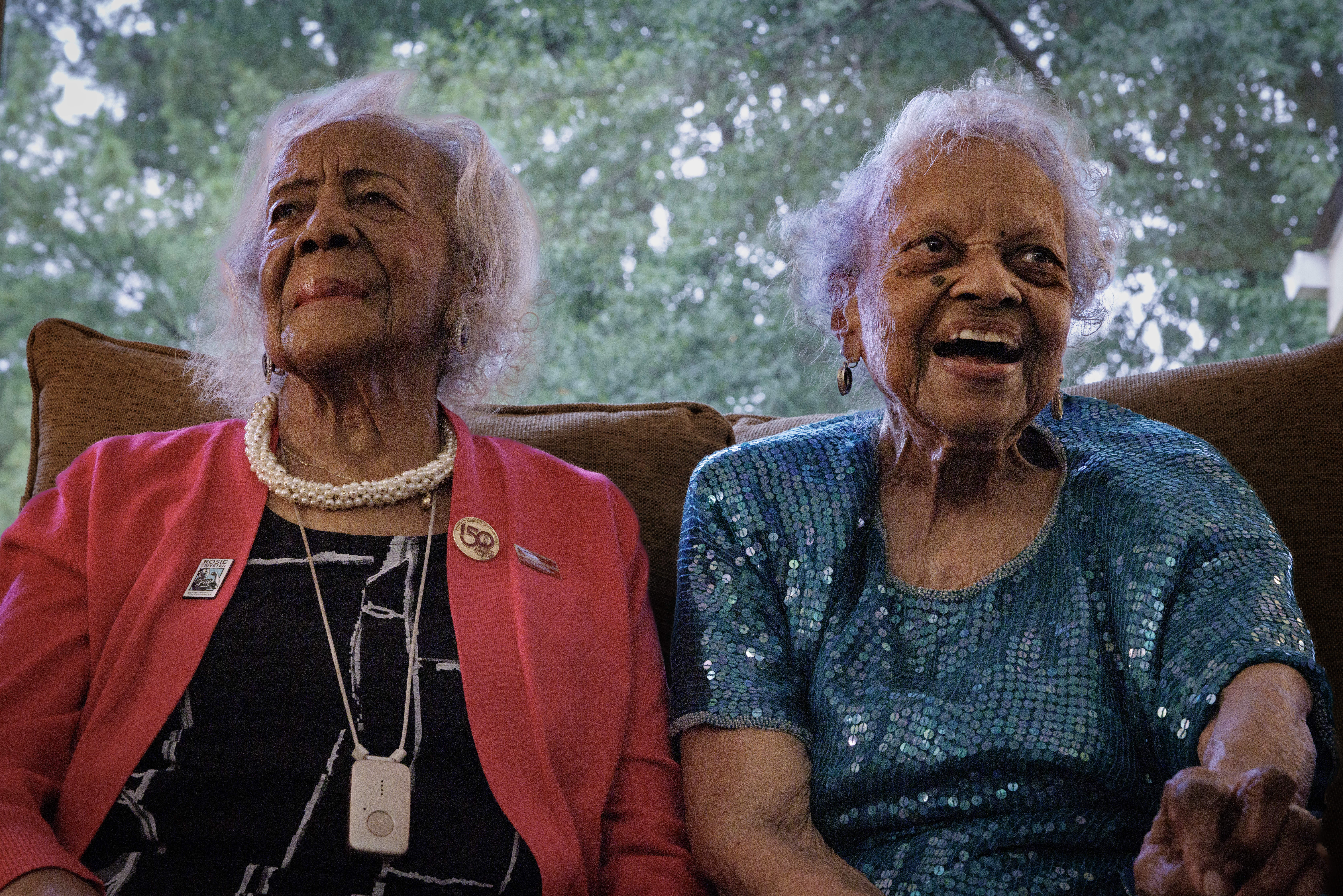 Velma Long, left, and Dorothy Boggess in Boggess’s home in Washington last week. (Tyler M. Andrews/The Washington Post)