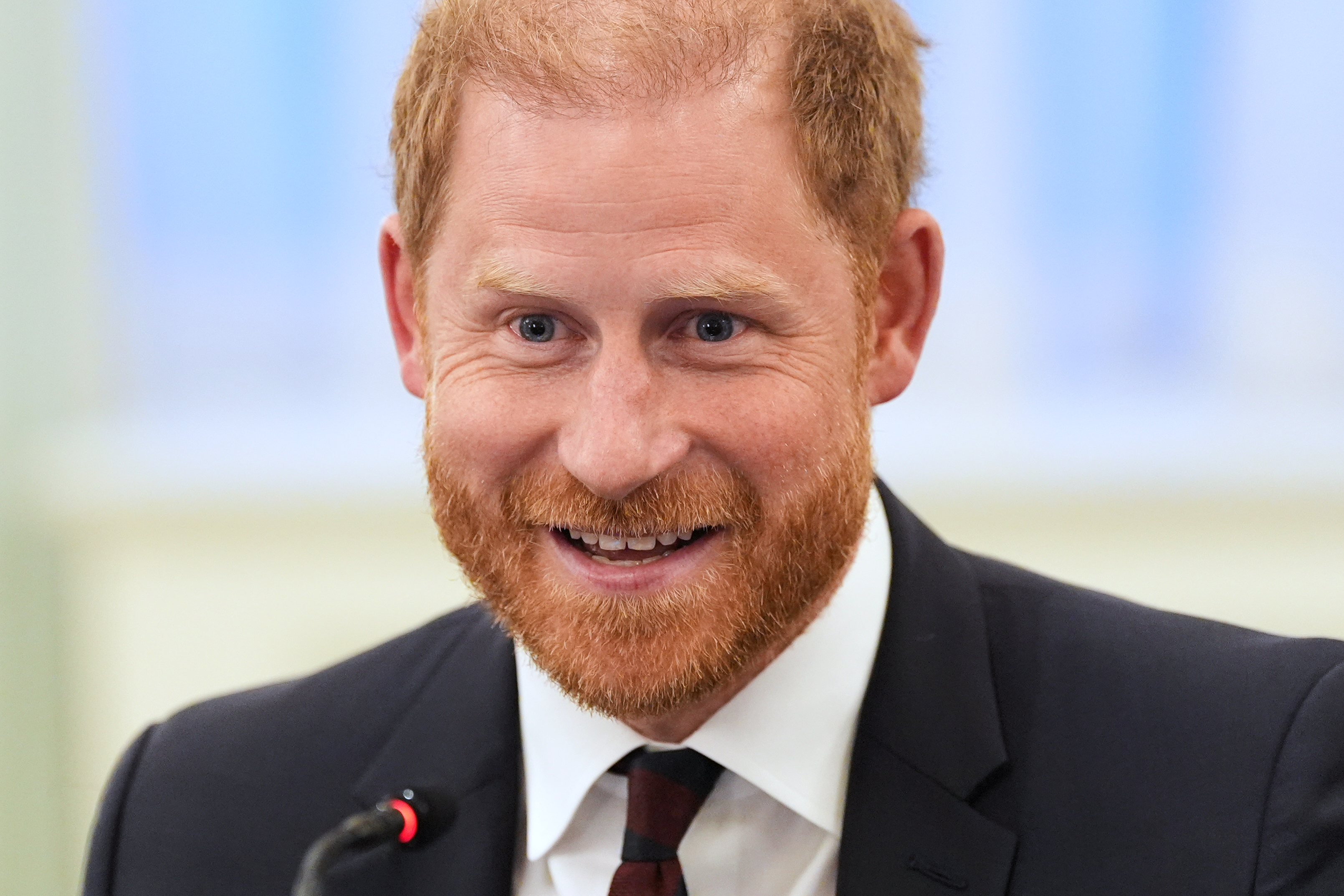Prince Harry urges communities to better apply veterans' skills, stating, 'The world needs more heroes' during roundtable with service members