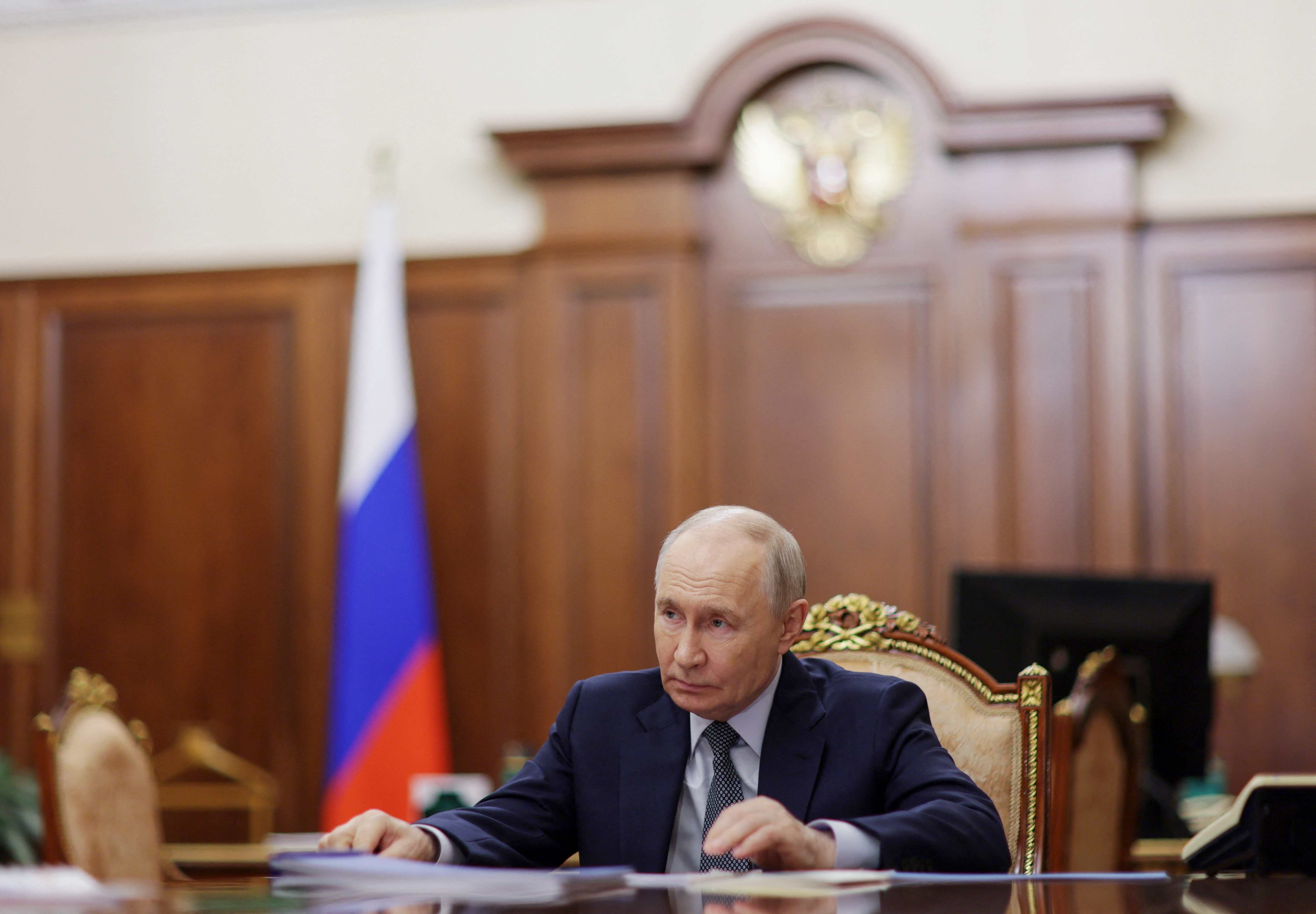 Russian President Vladimir Putin is "not going to be attacking a NATO territory," said President Donald Trump, downplaying concerns that Putin would order an attack on American allies in Europe while the U.S. is perceived to be weakened. (Mikhail Metzel/Pool/AFP/Getty Images)