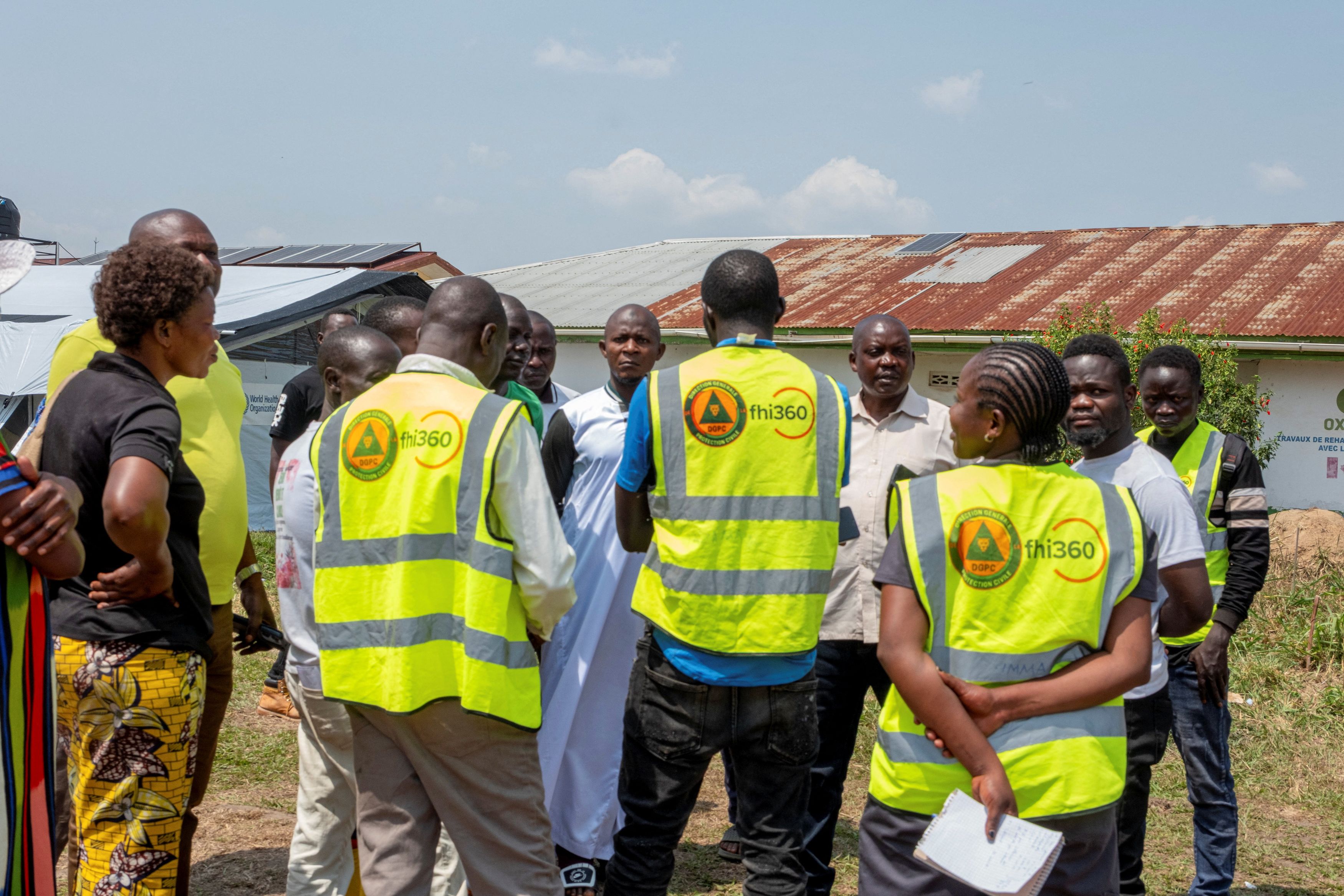 Health care workers involved in the Ebola response during a go-slow over unpaid salaries at Rwampara General Hospital in Ituri province, Democratic Republic of Congo, on Monday. (Gradel Muyisa Mumbere/Reuters)