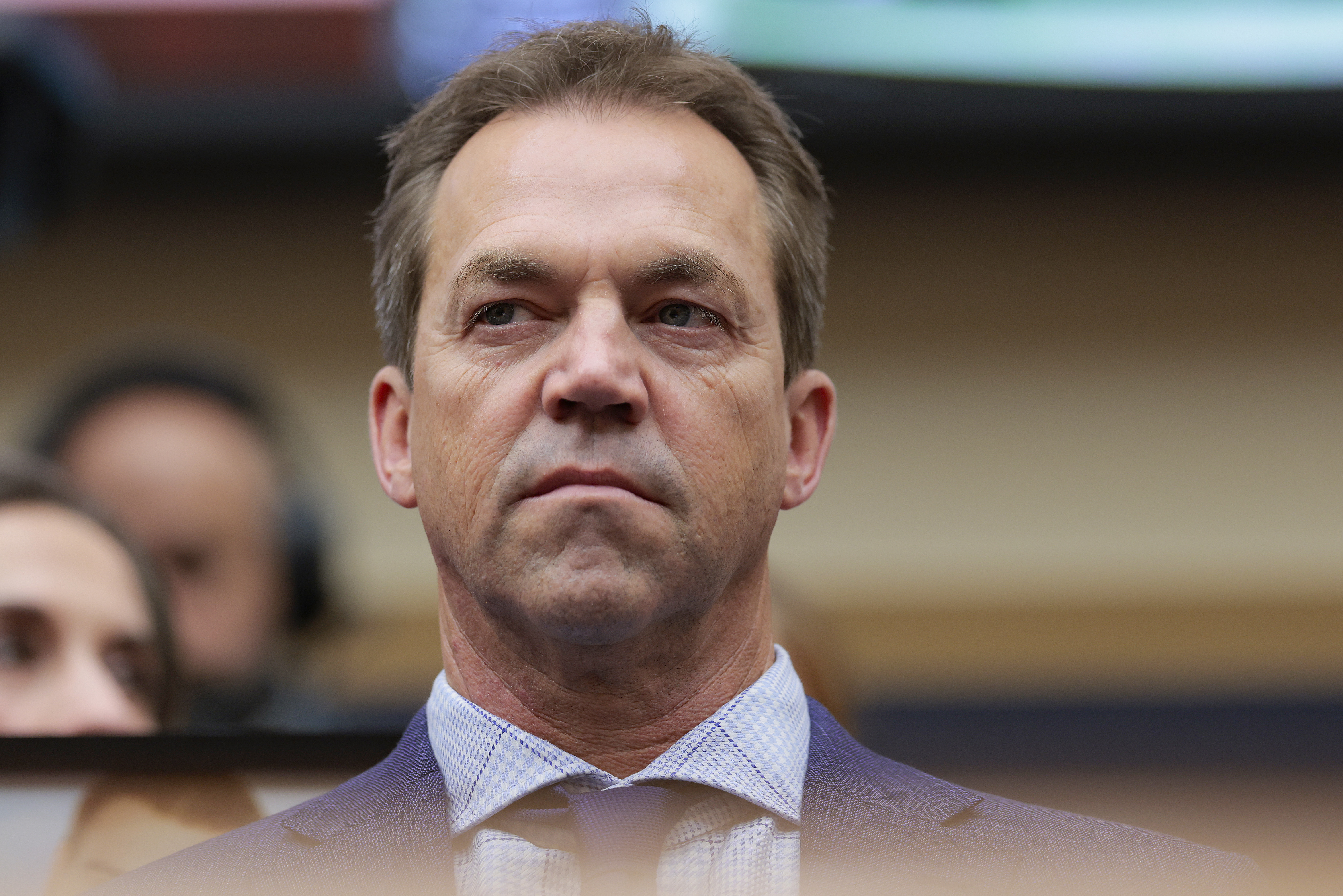 Bryon Noem, husband of then-Homeland Security Secretary Kristi L. Noem, watches as she testifies during a House Judiciary Committee hearing on March 4. (Heather Diehl/Getty Images)