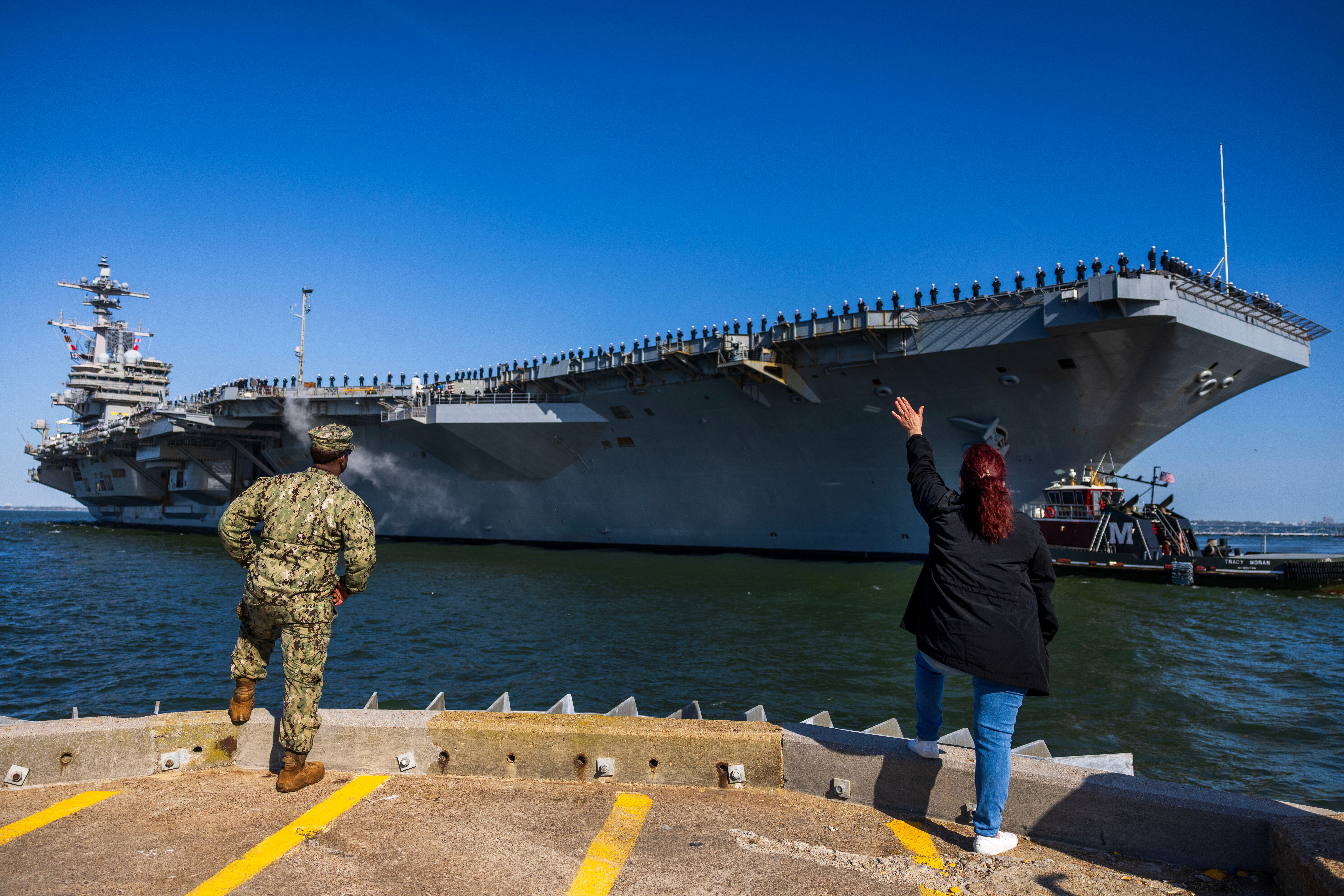 The USS George H.W. Bush pulls away from Naval Station Norfolk in Virginia last month. (Kendall Warner/The Virginian-Pilot/AP)