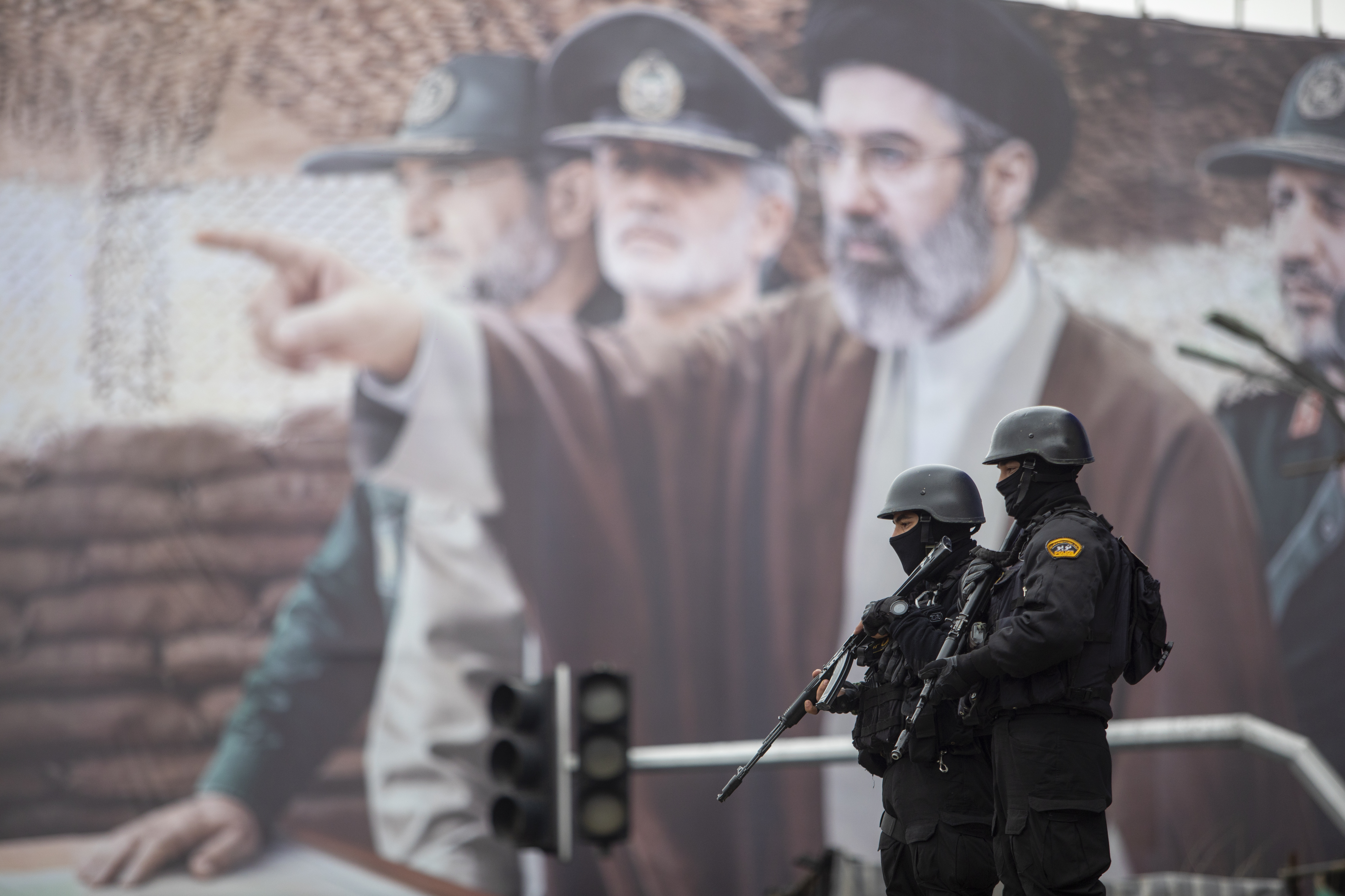 A billboard in Tehran on Friday shows Iranian Supreme Leader Mojtaba Khamenei with military commanders. (Majid Saeedi/Getty Images)