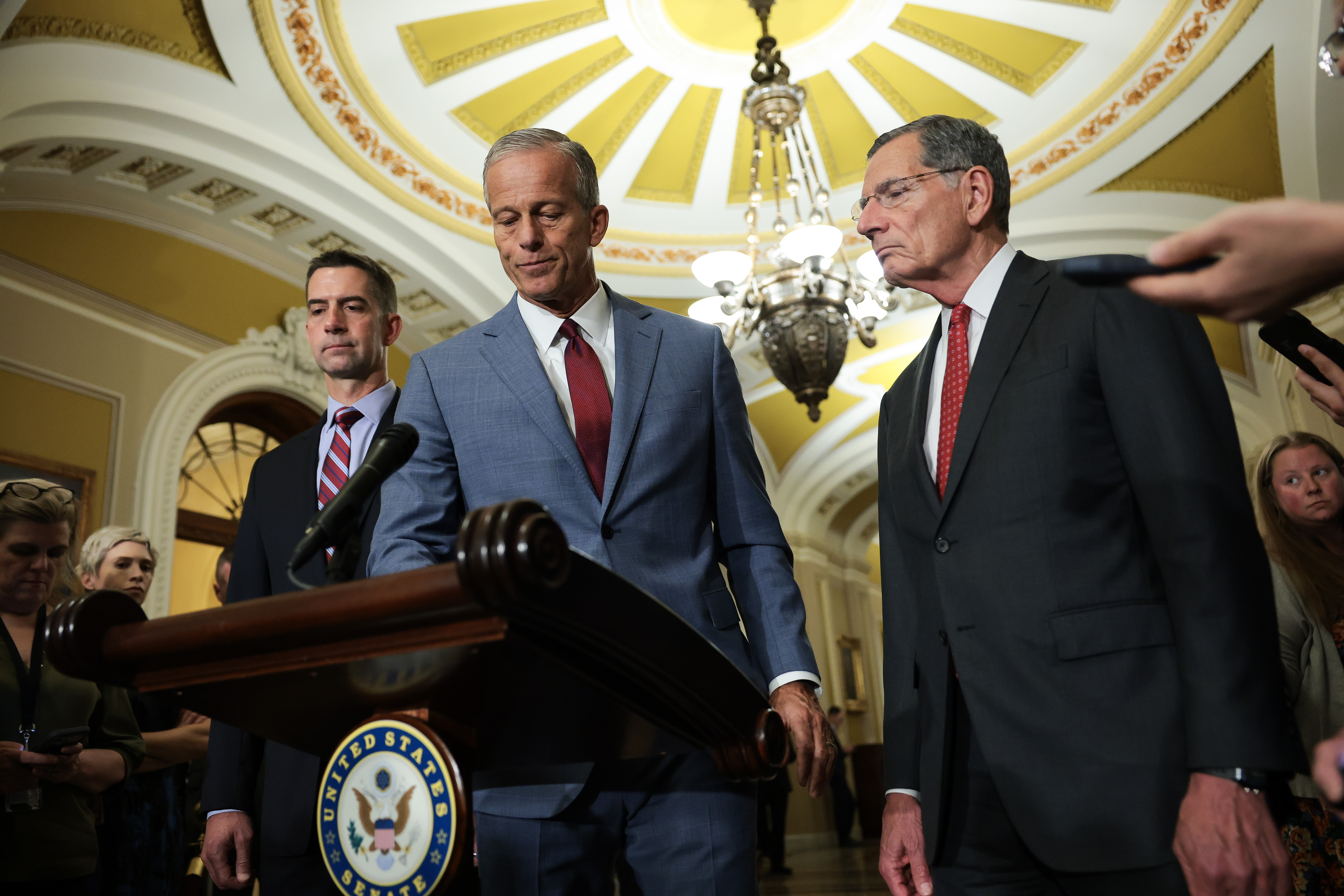 Senate Majority Leader John Thune (R-South Dakota), flanked by Republican Sens. Tom Cotton and John Barrasso, on Wednesday. (Anna Moneymaker/Getty Images)