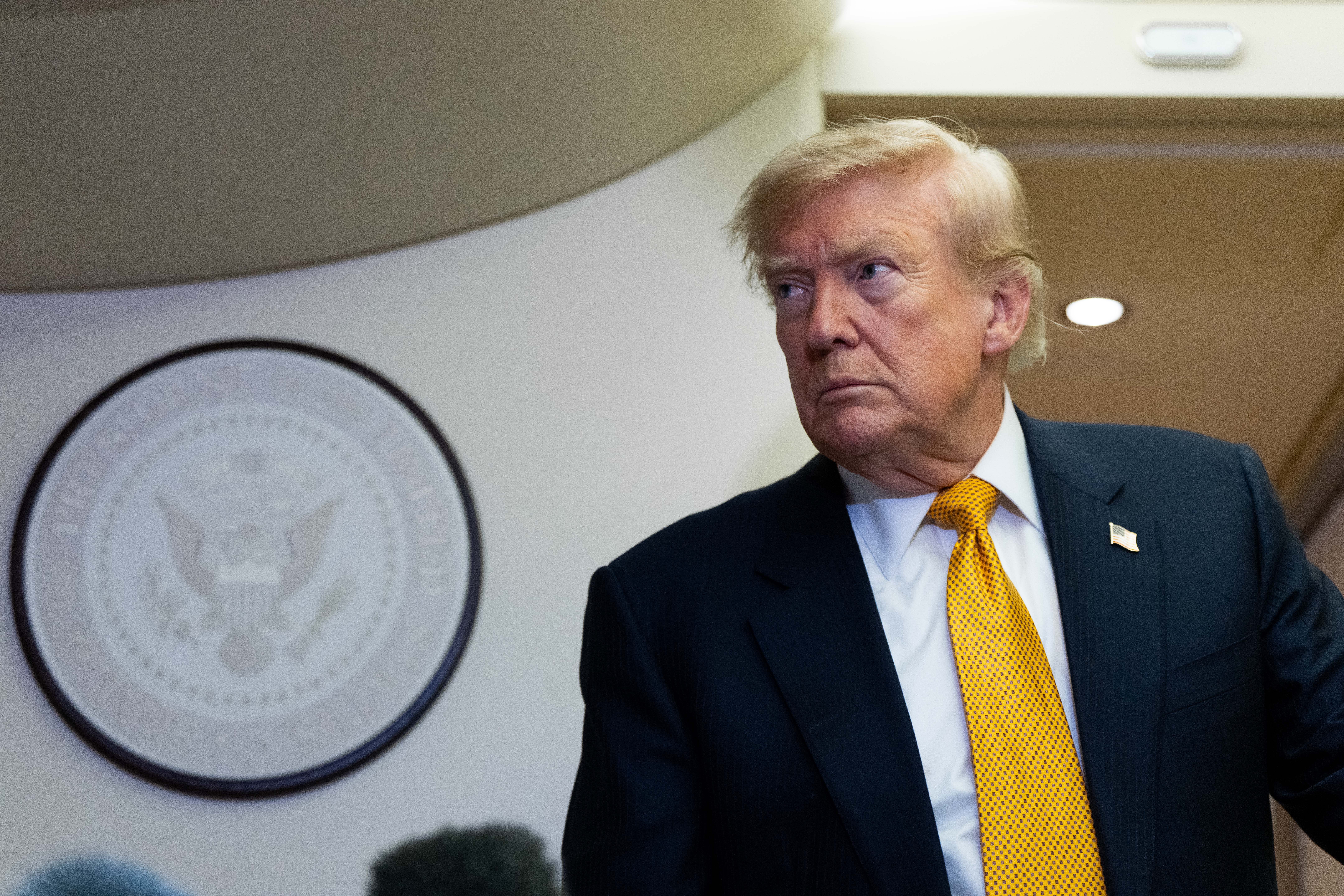 President Donald Trump's latest line of attack, as democratic socialists prevail in some elections, is to warn of a new "communist menace." (Alex Brandon/AP)