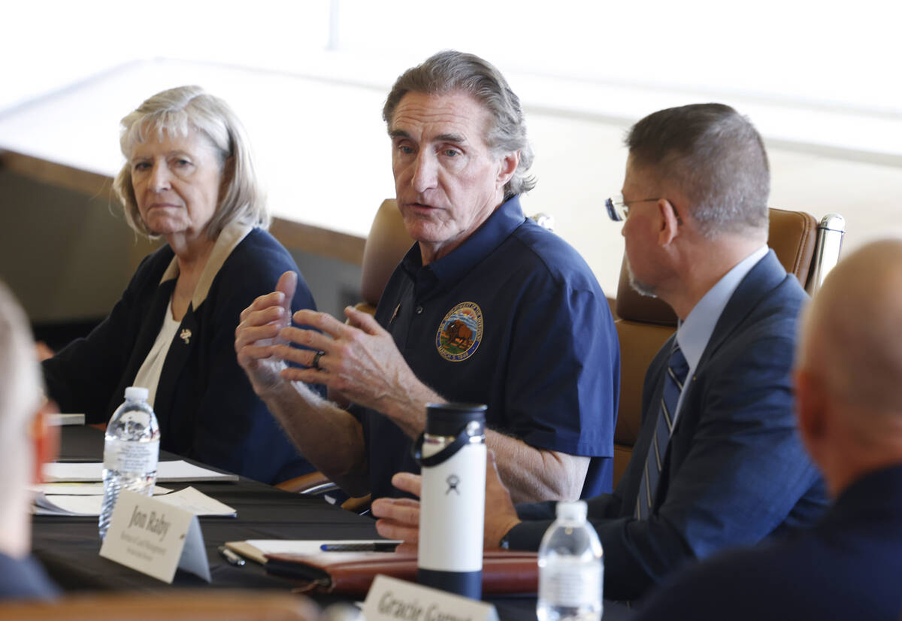 Interior Secretary Doug Burgum, center, speaks during a roundtable discussion in Las Vegas on outdoor recreation and grazing on public lands. With him is Karen Budd-Falen, left, an adviser to Burgum, and Jon Raby, director of the Bureau of Land Management’s Nevada office. (Las Vegas Review-Journal/Tribune News Service)