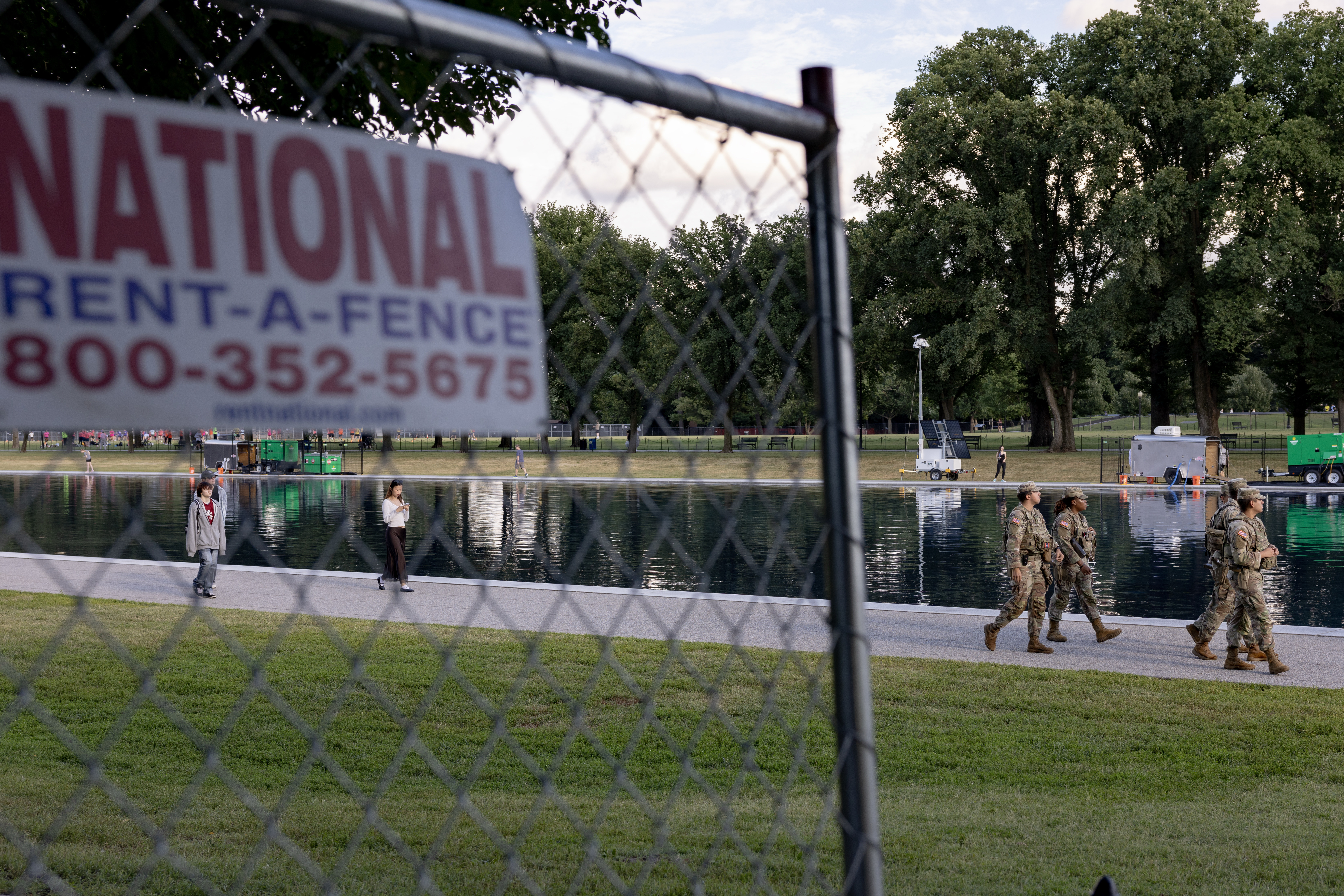 A chain-link fence has been erected around much of the Reflecting Pool. (Tyler M. Andrews/The Post)