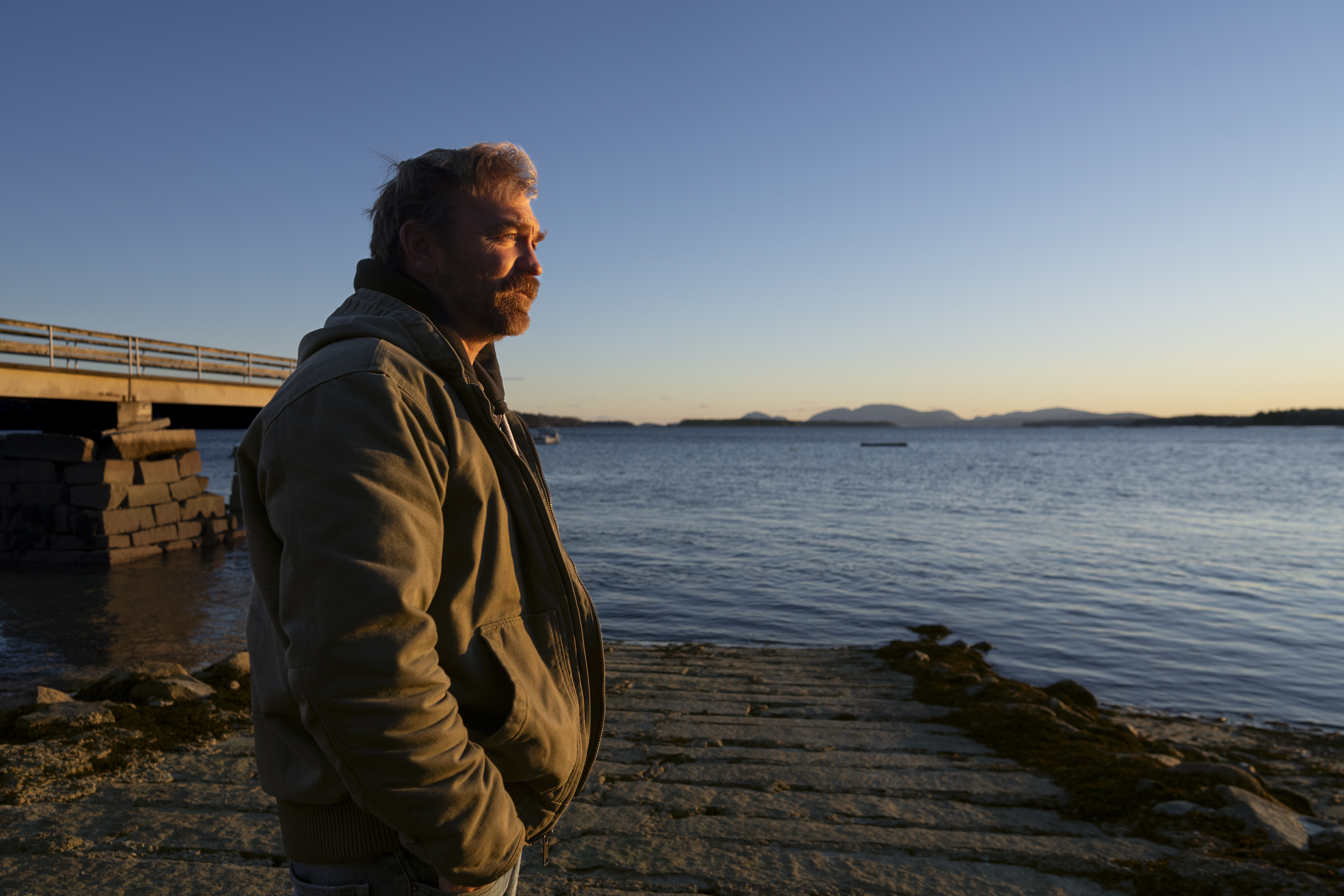 Democratic Senate candidate Graham Platner at the waterfront in Sullivan, Maine, last year. (Gregory Rec/Portland Press Herald/Getty Images)