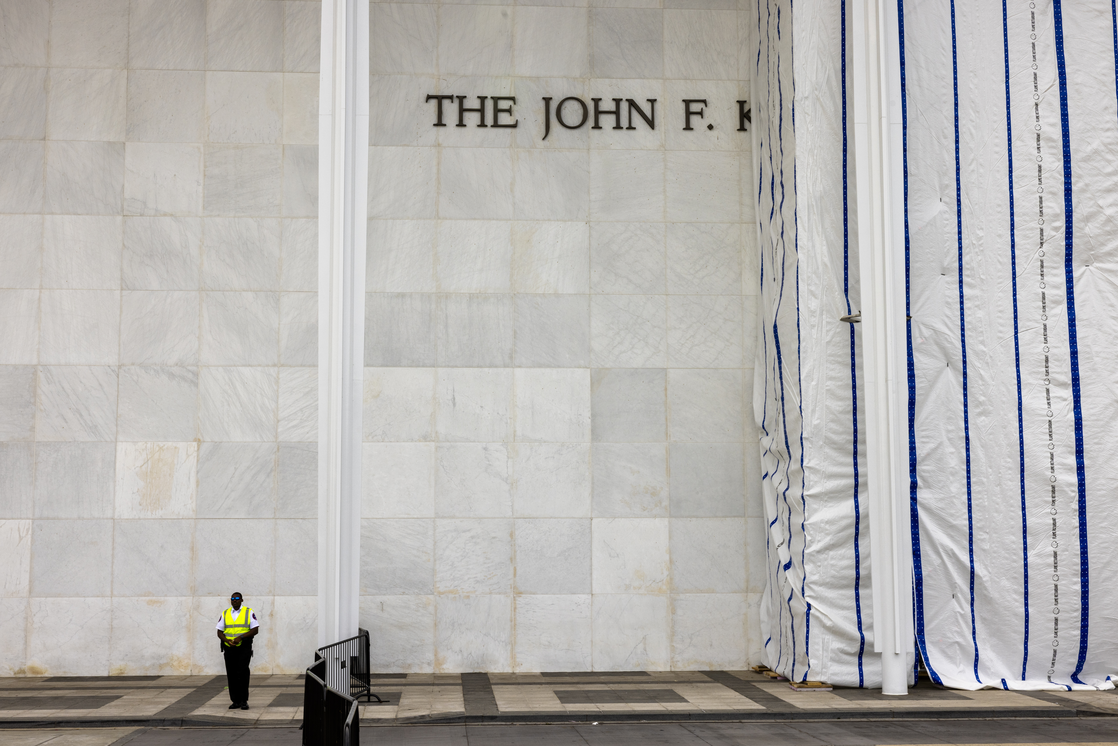 The Kennedy Center on June 13. Tarps cover the area where President Donald Trump’s name used to be. (Robb Hill/For The Washington Post)