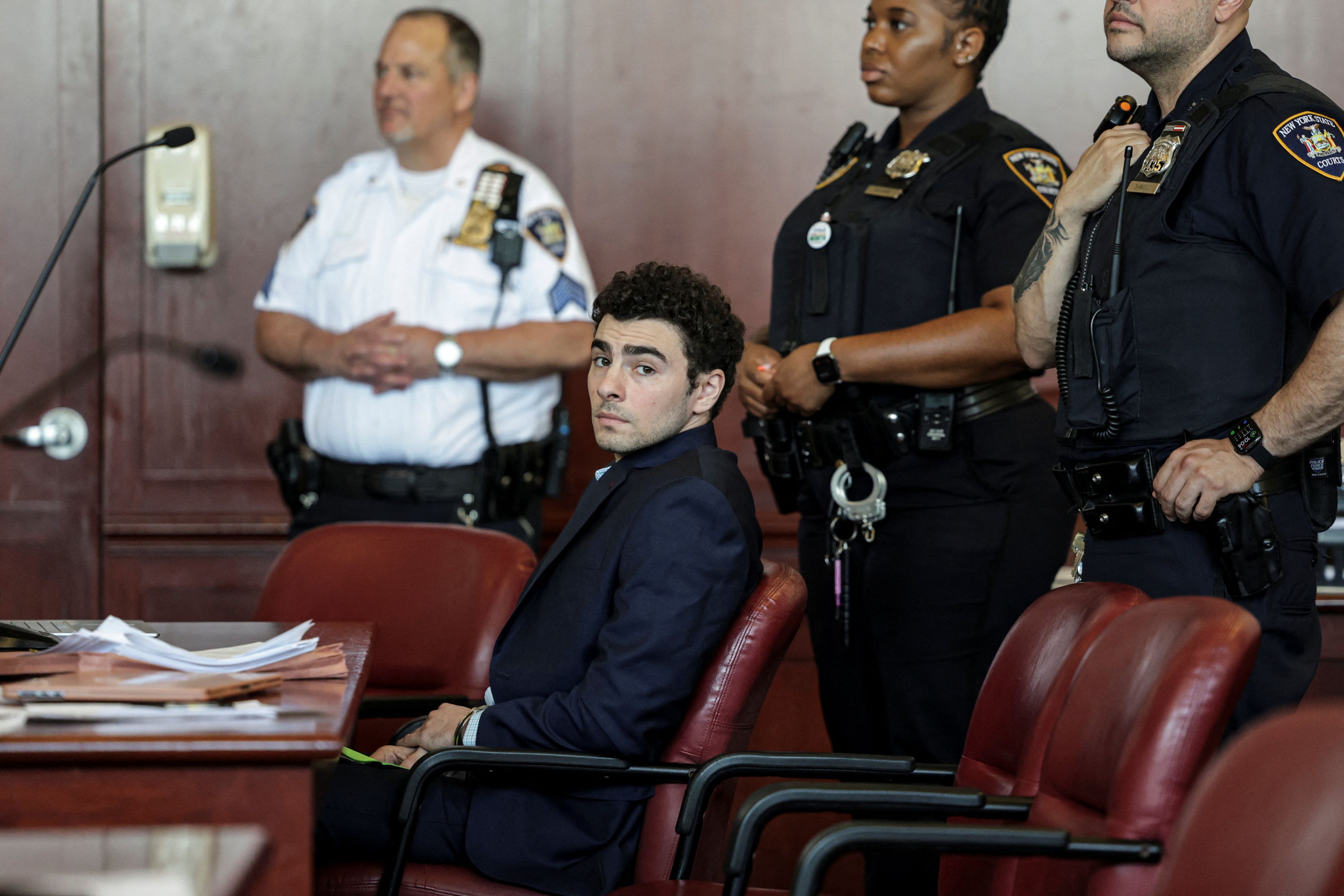 Luigi Mangione attends a hearing at the Manhattan Supreme Court on Monday. (Jeenah Moon/Reuters)
