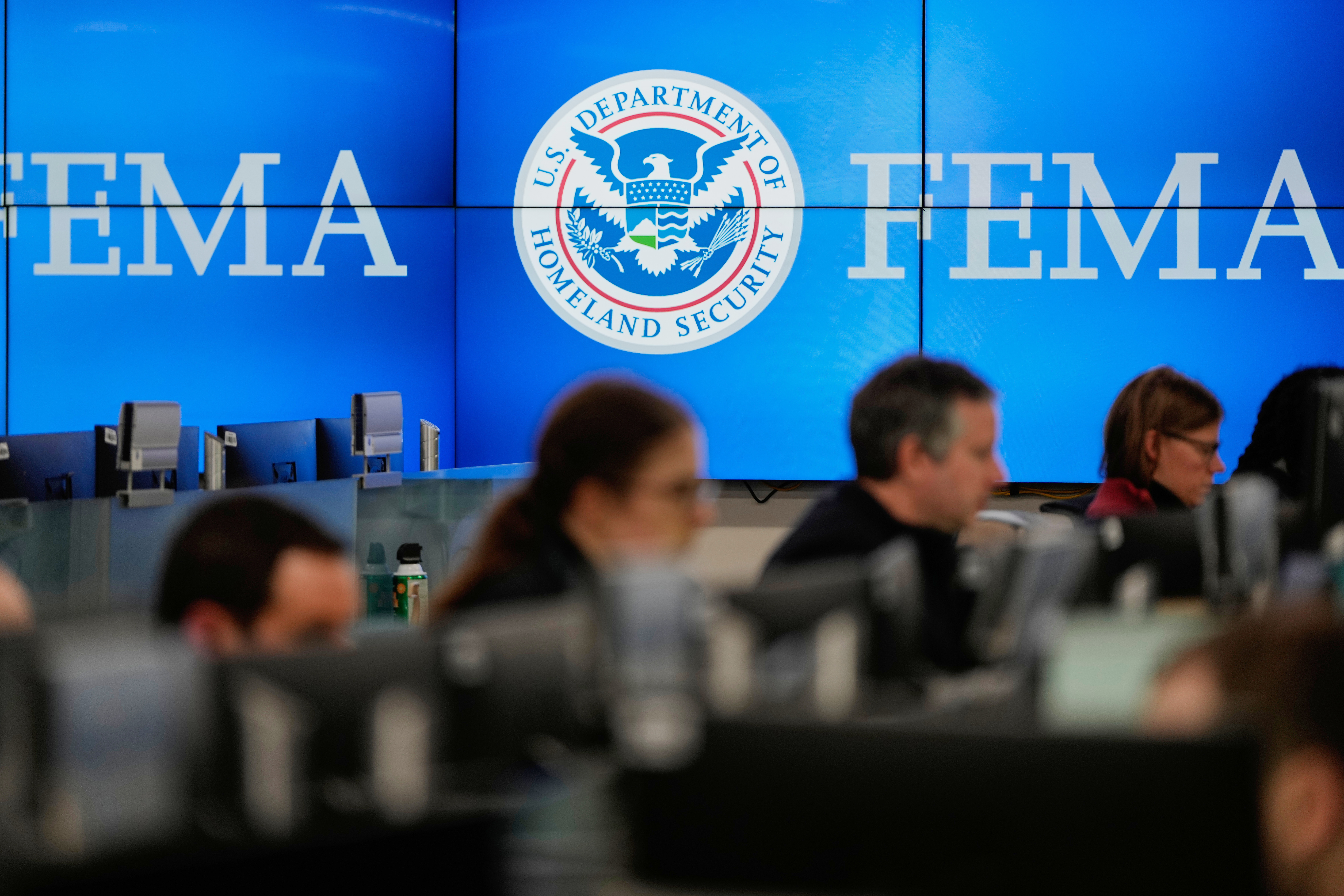 People are shown working at FEMA headquarters in Washington on Jan. 24. (Julia Demaree Nikhinson/AP)