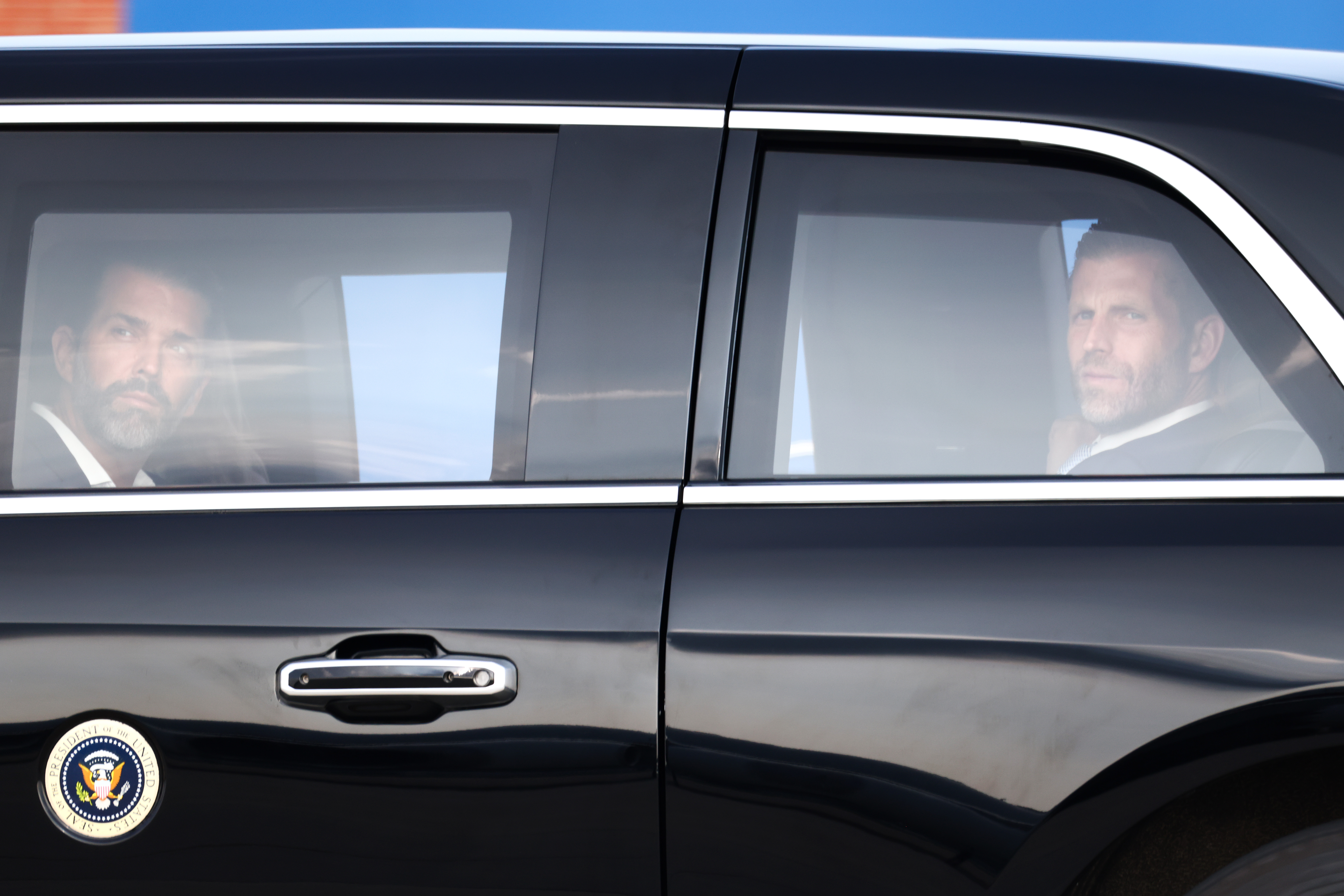 The companies have collectively generated at least $3.2 billion in direct government business since Donald Trump Jr., left, and Eric Trump invested. (Finn Gomez/Getty)