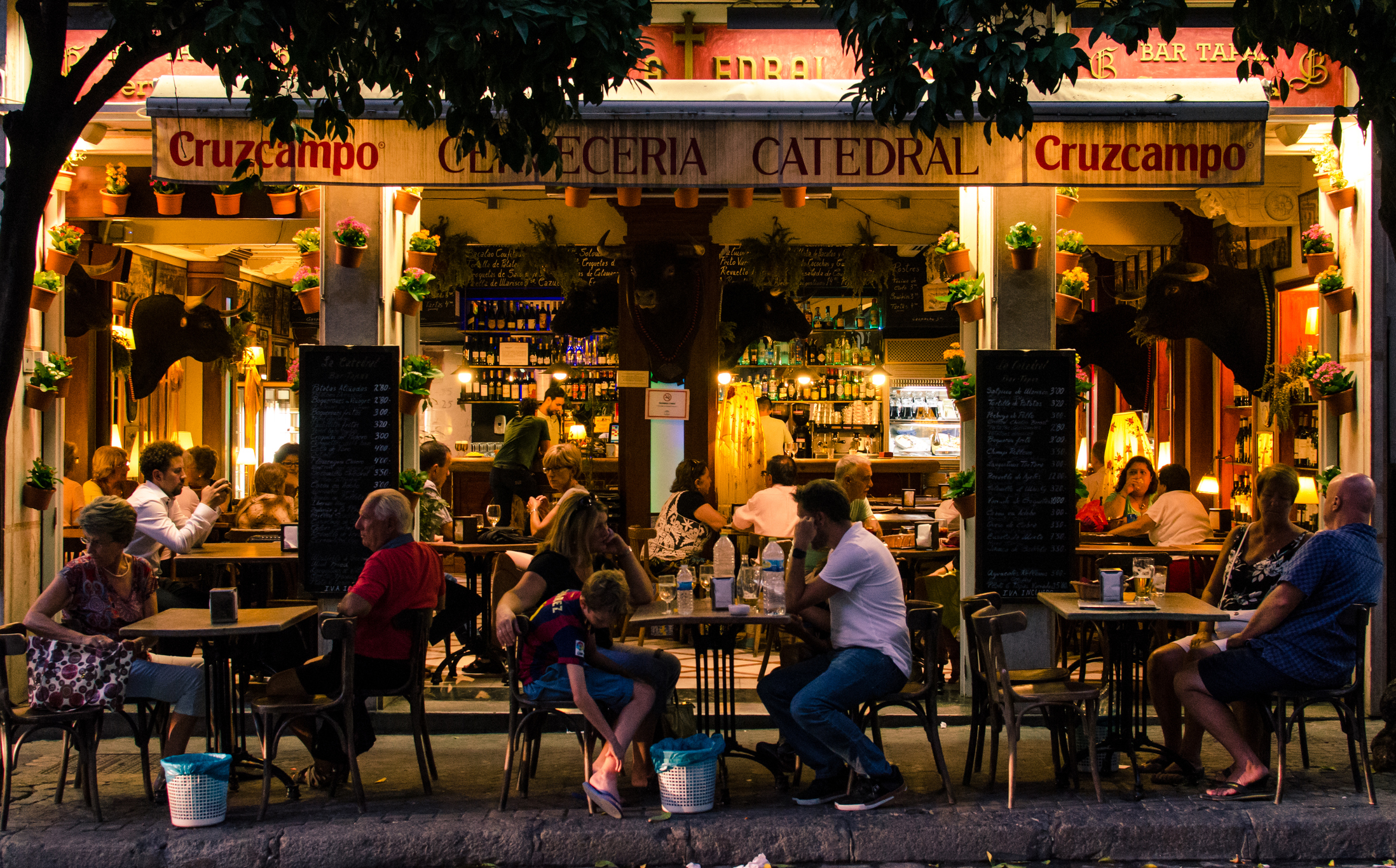 A busy restaurant in the center of Seville, Spain. (iStock)