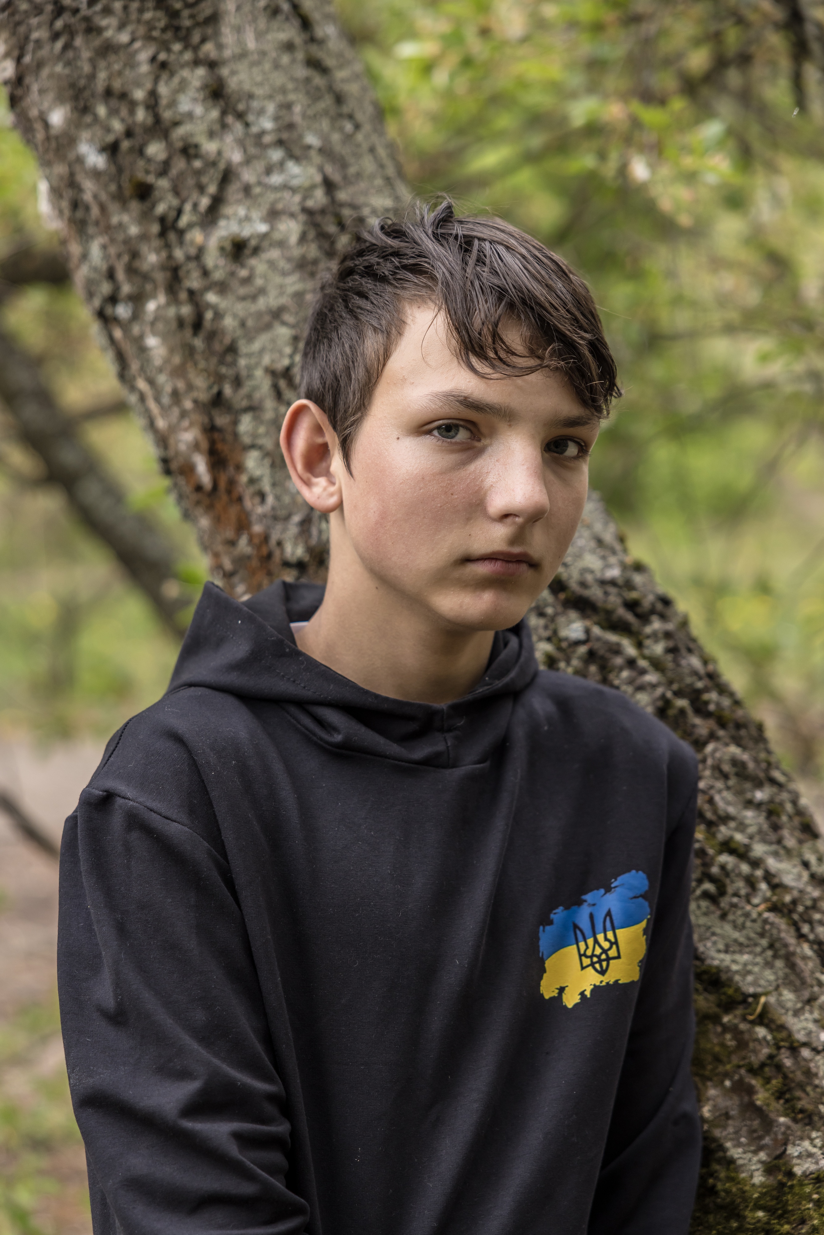 Anatolii Prokhorenko, 12, disabled a Russian fiber-optic drone last month that was heading toward his younger siblings and other children at their house in Ukraine’s northern Chernihiv region. (Oksana Parafeniuk/For The Washington Post)