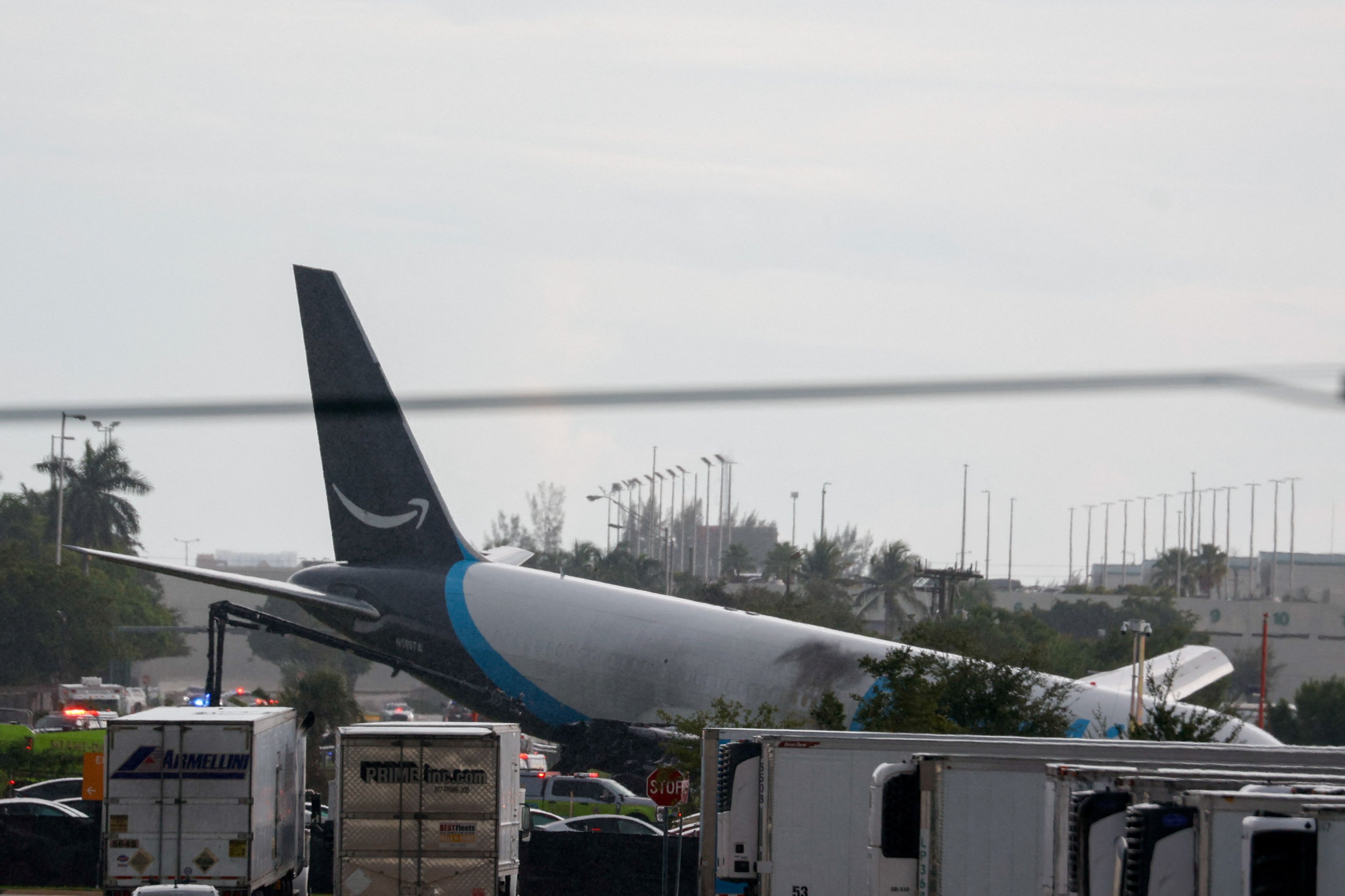 An Amazon Air cargo plane that airport officials said overshot a runway at Miami International Airport on Sunday. (Marco Bello/Reuters)