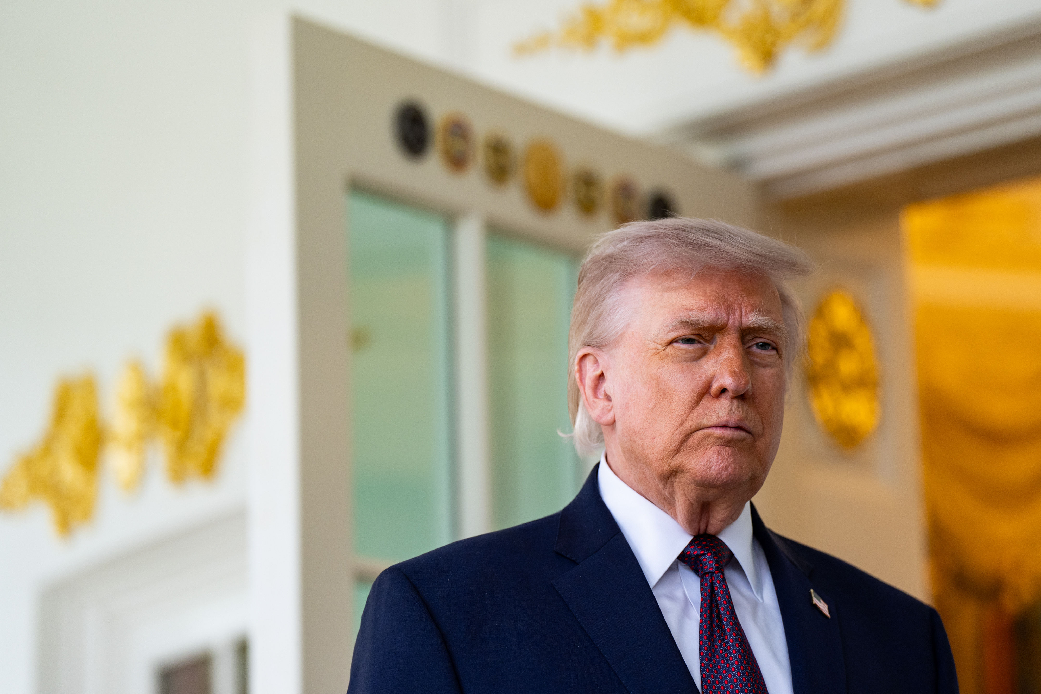 President Donald Trump speaks to reporters on April 13 outside the Oval Office. (Salwan Georges/For The Washington Post)