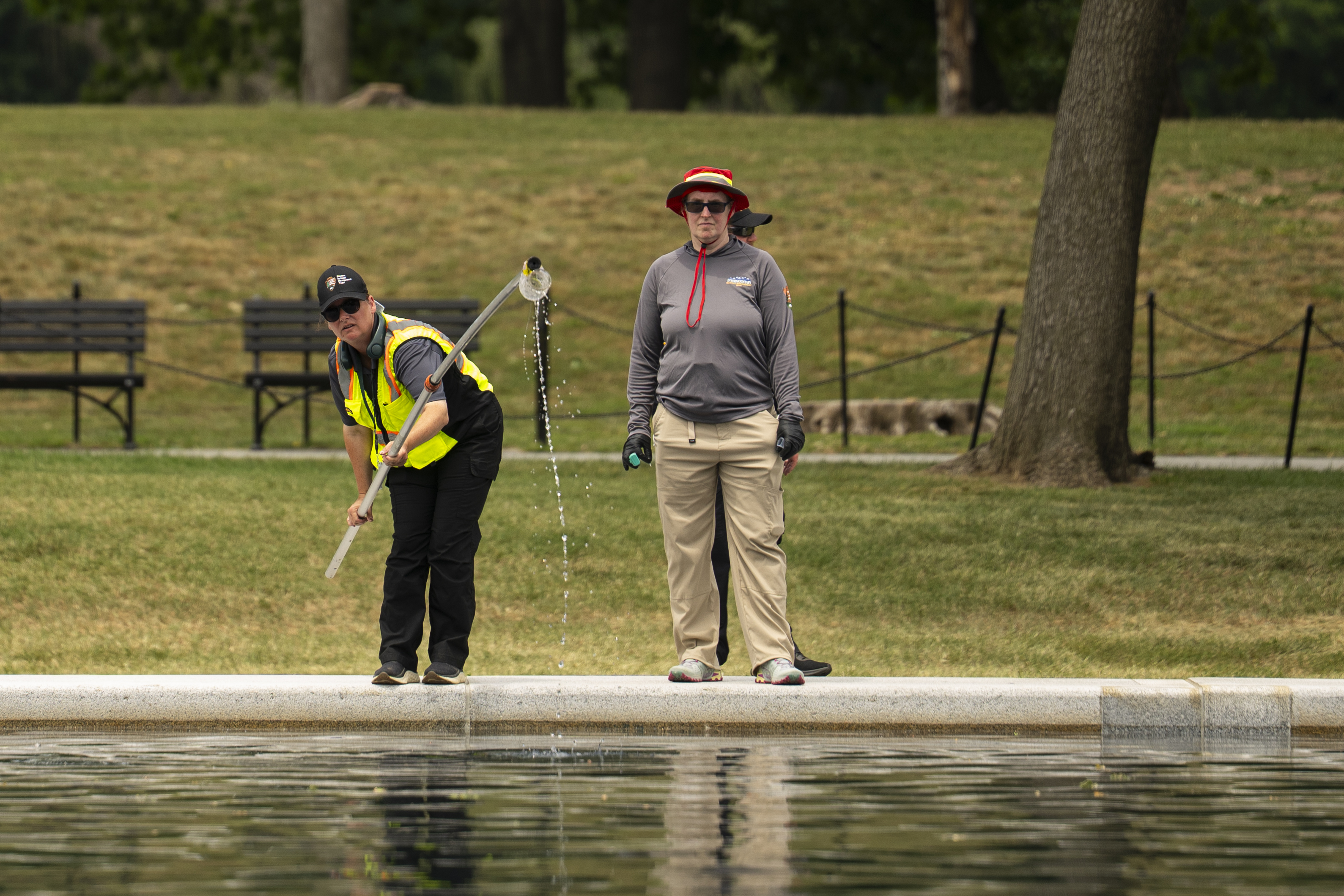In this episode, a water sample is taken from the algae-plagued pool. (Al Drago/For The Washington Post)