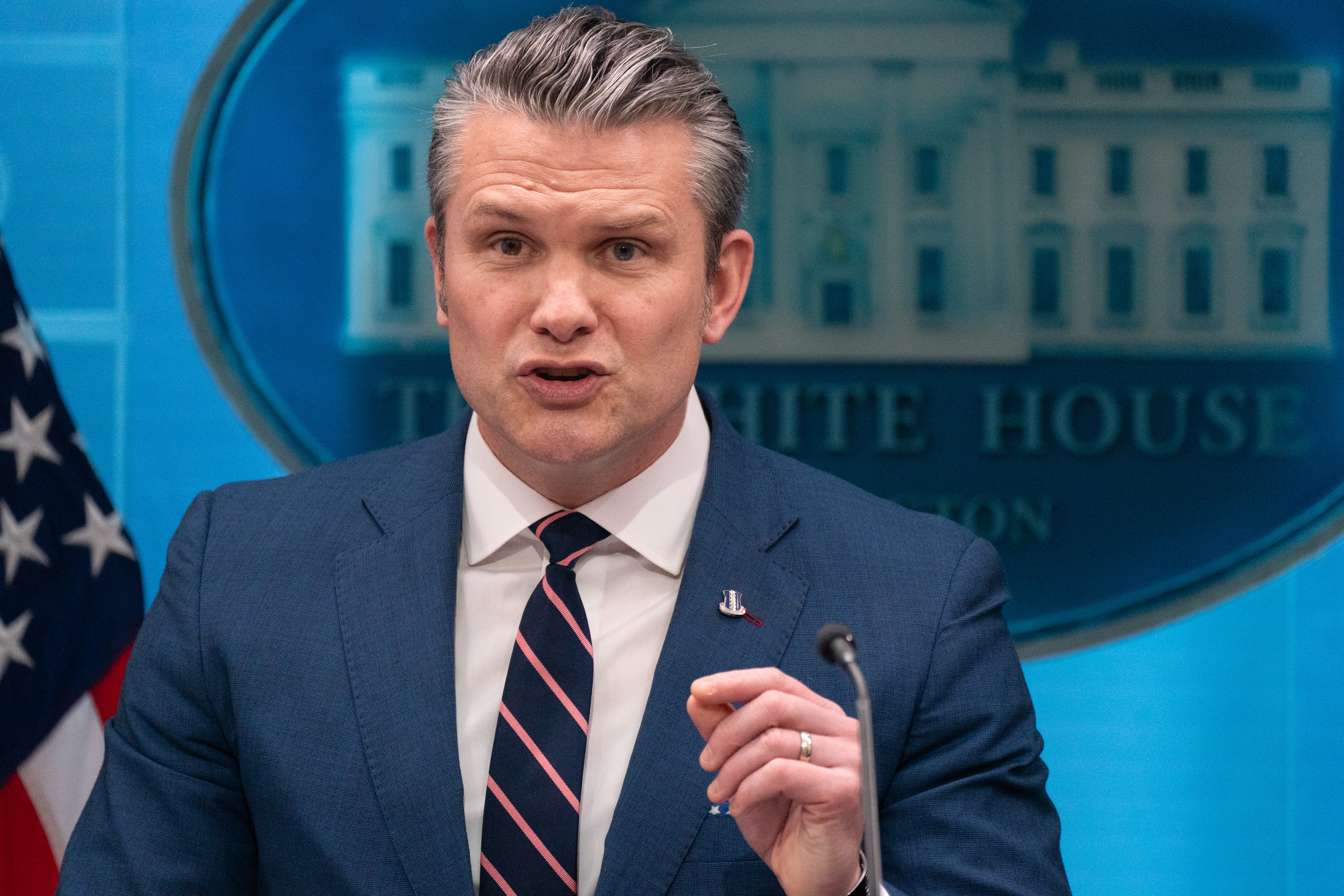 Defense Secretary Pete Hegseth speaks to reporters Monday at the White House. (Maxine Wallace/The Washington Post)