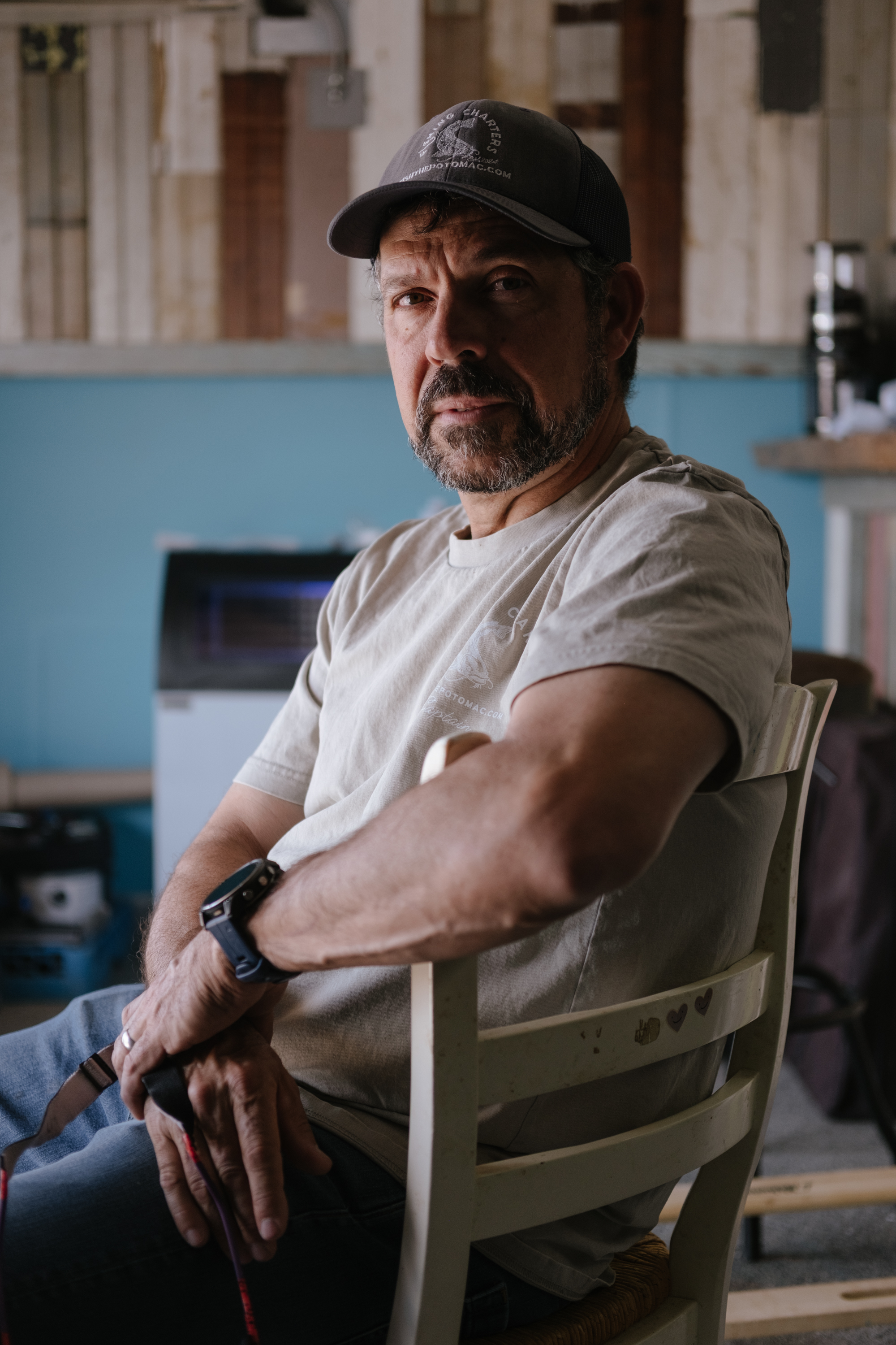 Capt. Tim Blanchard in his tackle shop last month at the Yards Marina in D.C. The shop is set to open May 9. (Jordan Tovin/For The Washington Post)