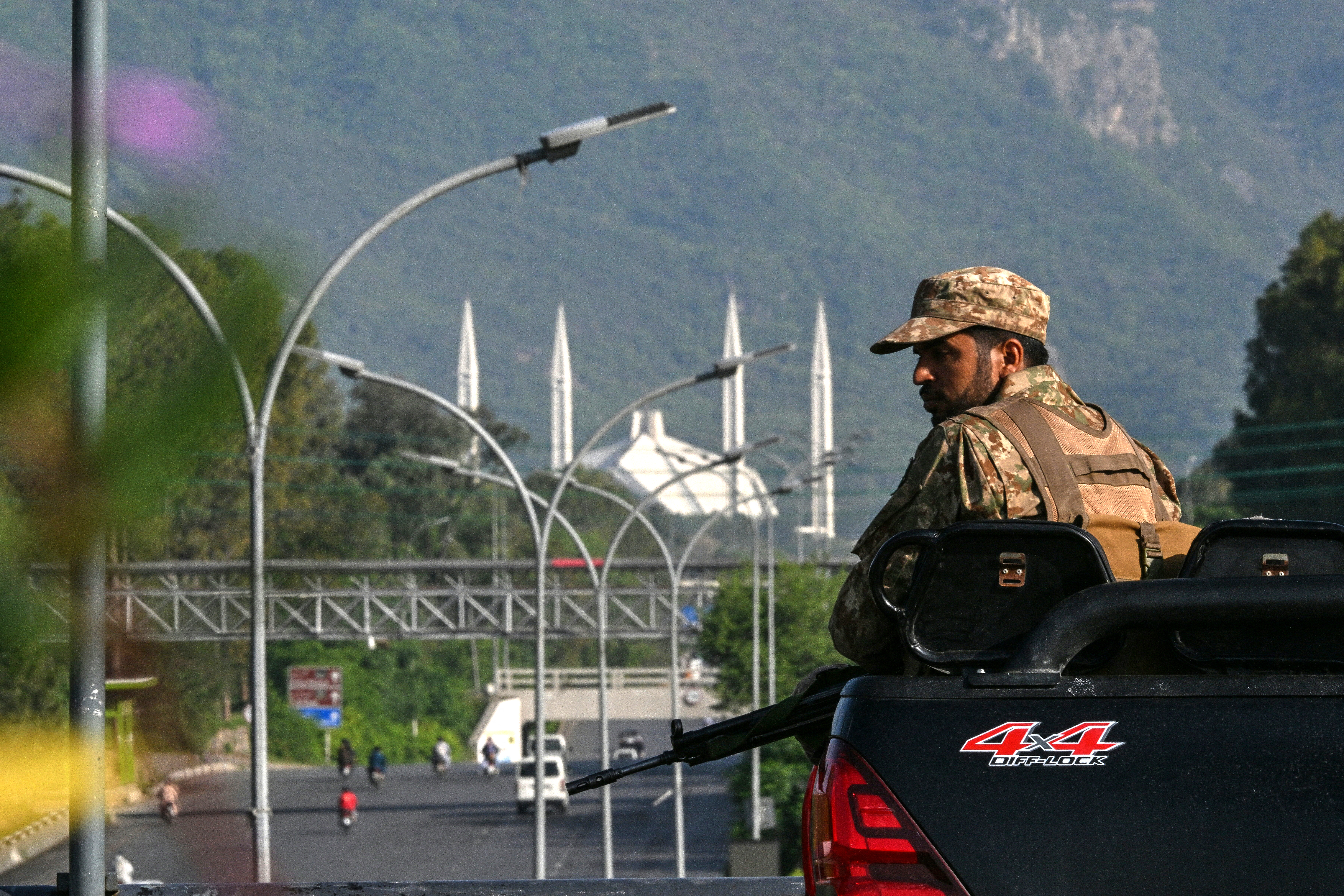 A soldier keeps watch in the “red zone” governmental area of Islamabad, Pakistan, on Saturday. (Asif Hassan/AFP/Getty Images)
