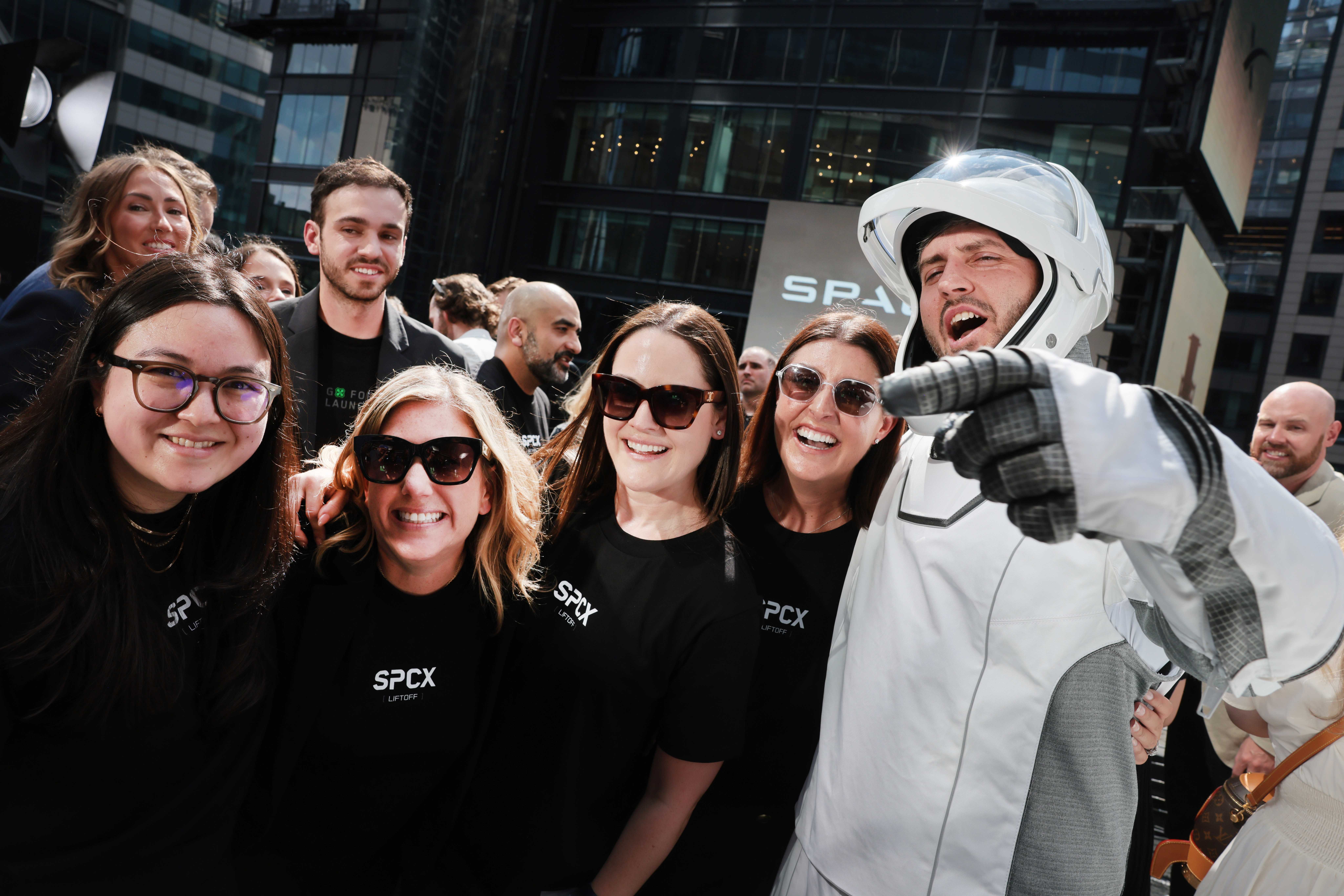 SpaceX employees celebrate the market close of the SpaceX IPO on June 12 at the Nasdaq Marketsite in New York City. (Spencer Platt/Getty Images)