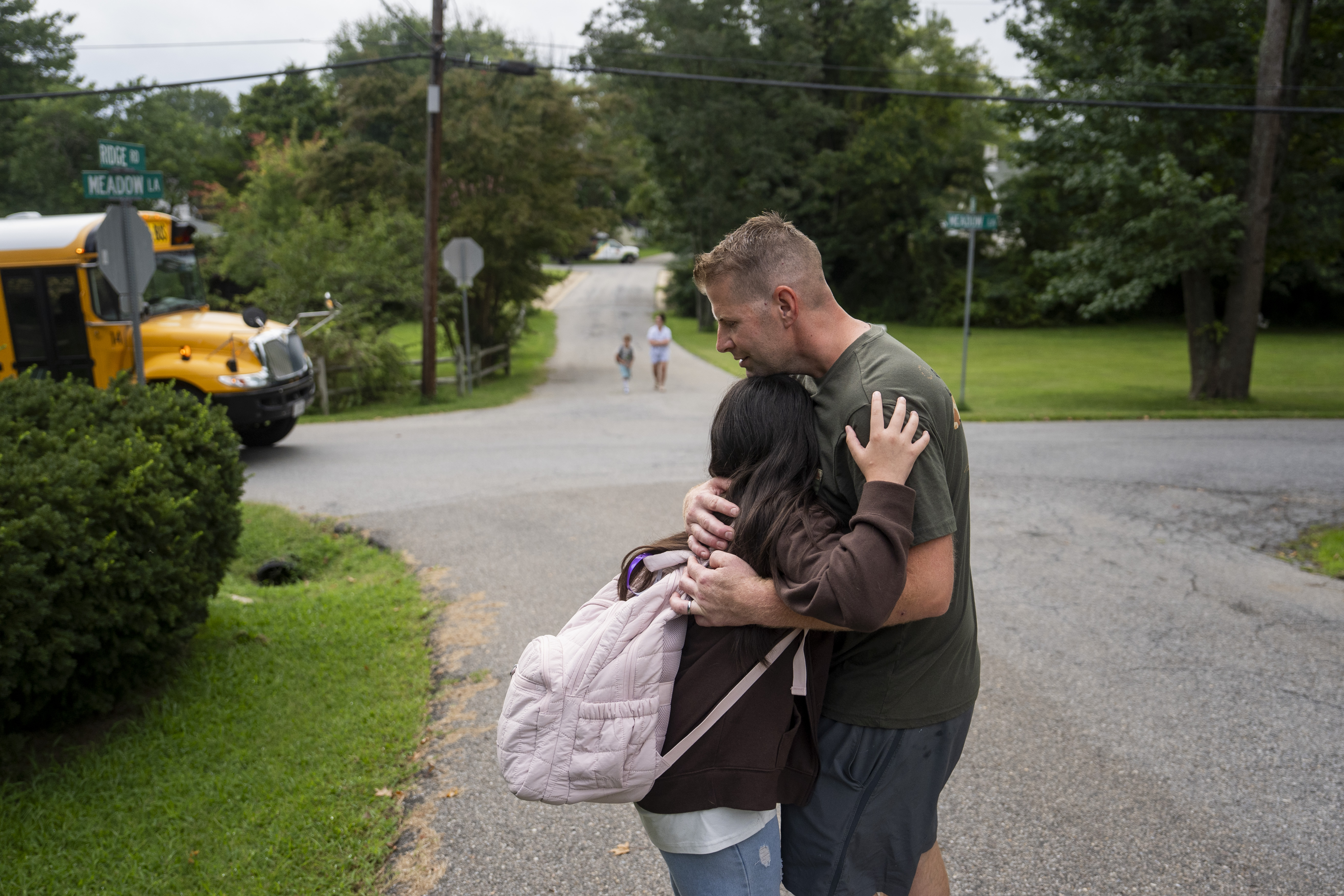 Samuel Wilbanks hugs his daughter, Ariana, before school in Chesapeake Beach, Maryland. (Carolyn Van Houten/For The Washington Post)