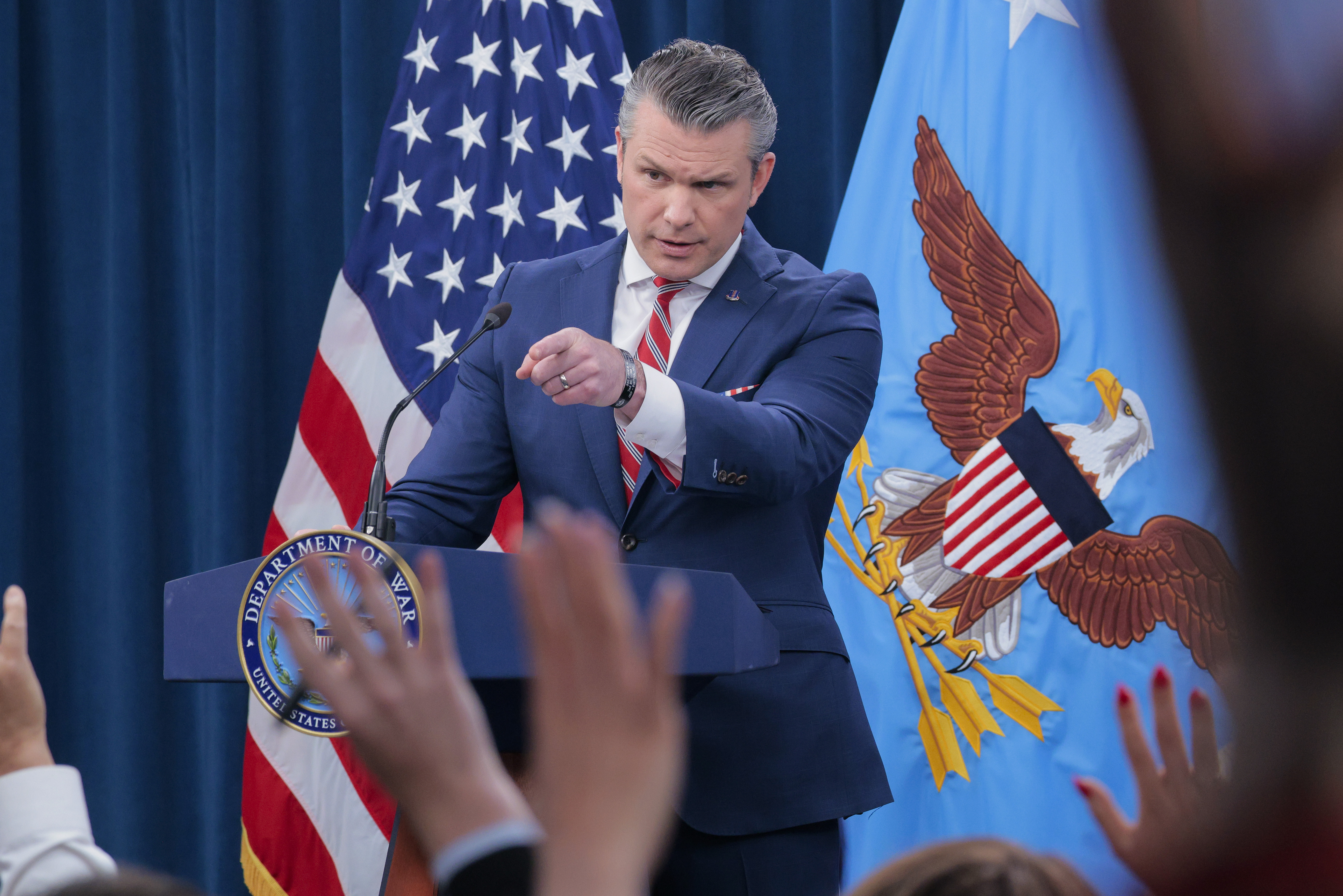 Defense Secretary Pete Hegseth takes questions Tuesday during a press briefing at the Pentagon. (Chip Somodevilla/Getty Images)